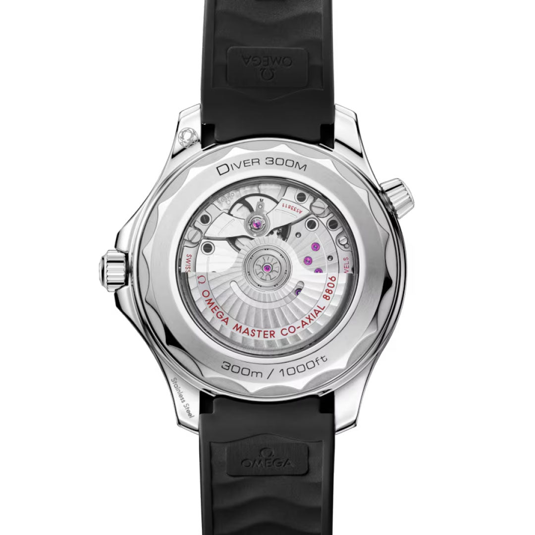 The OMEGA Seamaster Diver 300M Co-Axial Master Chronometer 42mm Watch features a sapphire-crystal caseback revealing its precise movement, with the case and black strap displaying "OMEGA" branding and water resistance details.