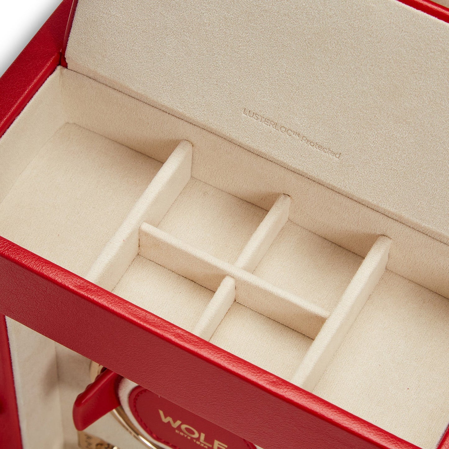An open view of the WOLF 1834 Palermo Single Watch Winder with Jewellery Storage in a striking red exterior is showcased, revealing a beige interior with designated compartments to organize your jewelry. The brand "WOLF" is prominently displayed on the winder, which features an adjustable power reserve setting. An embossed "Lusterlocâ„¢ protected" mark graces the interior lid, combining elegance and functionality seamlessly.
