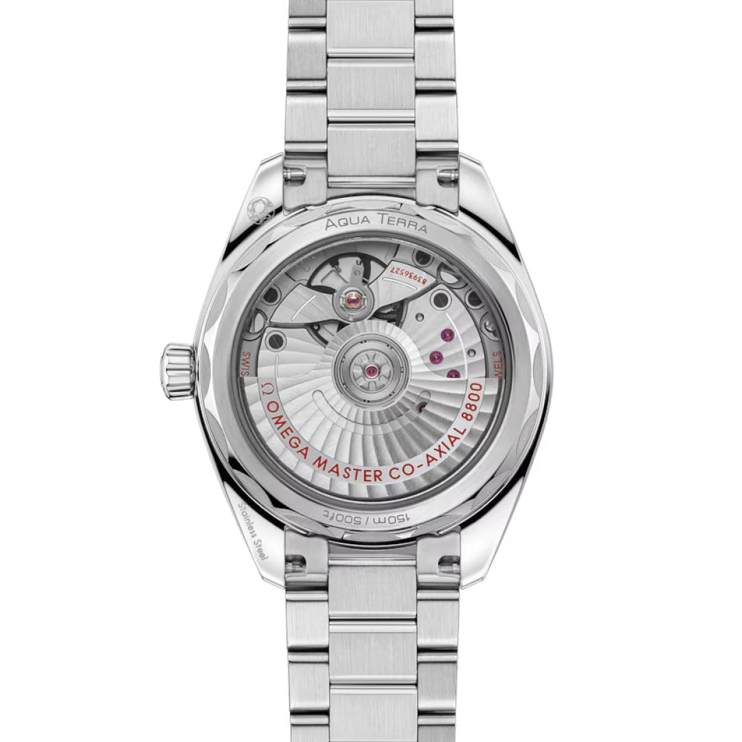 Close-up of the OMEGA Seamaster Aqua Terra Shades Co-Axial Master Chronometer 34mm Watch’s back, showing the intricate calibre 8800 movement and engraved details through its transparent case back and stainless steel bracelet.