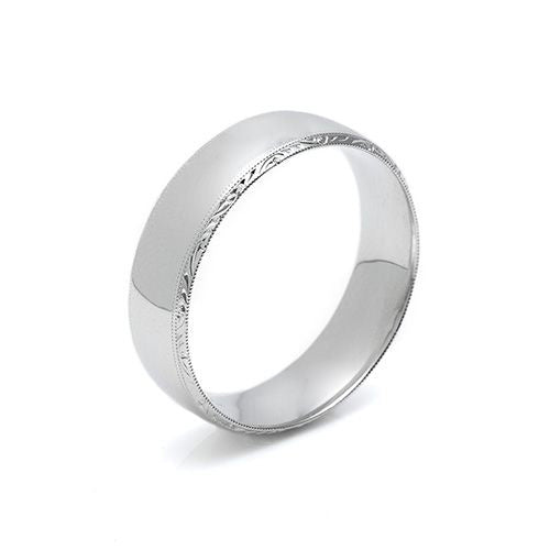The Tacori Platinum Wedding Band by Tacori is a sleek silver ring featuring a smooth finish and a delicate engraved design along the edges, displayed against a white background.