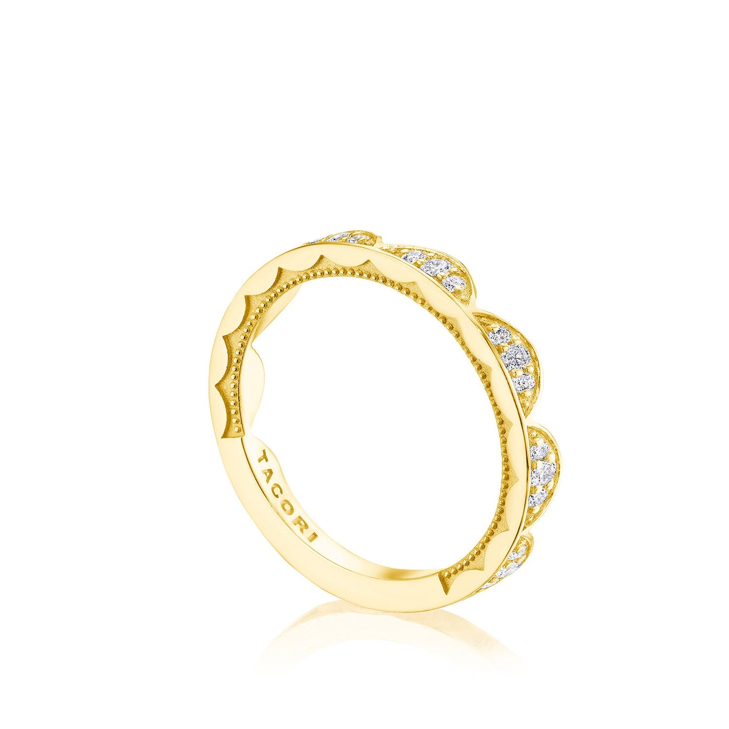 The Tacori Crescent Crown 18K Yellow Gold Round Brilliant Diamond Anniversary Ring features a scalloped design adorned with small diamonds around the band. It elegantly displays the Signature Crescent design, with "Tacori" engraved on the interior—perfect for celebrating life's most cherished moments.