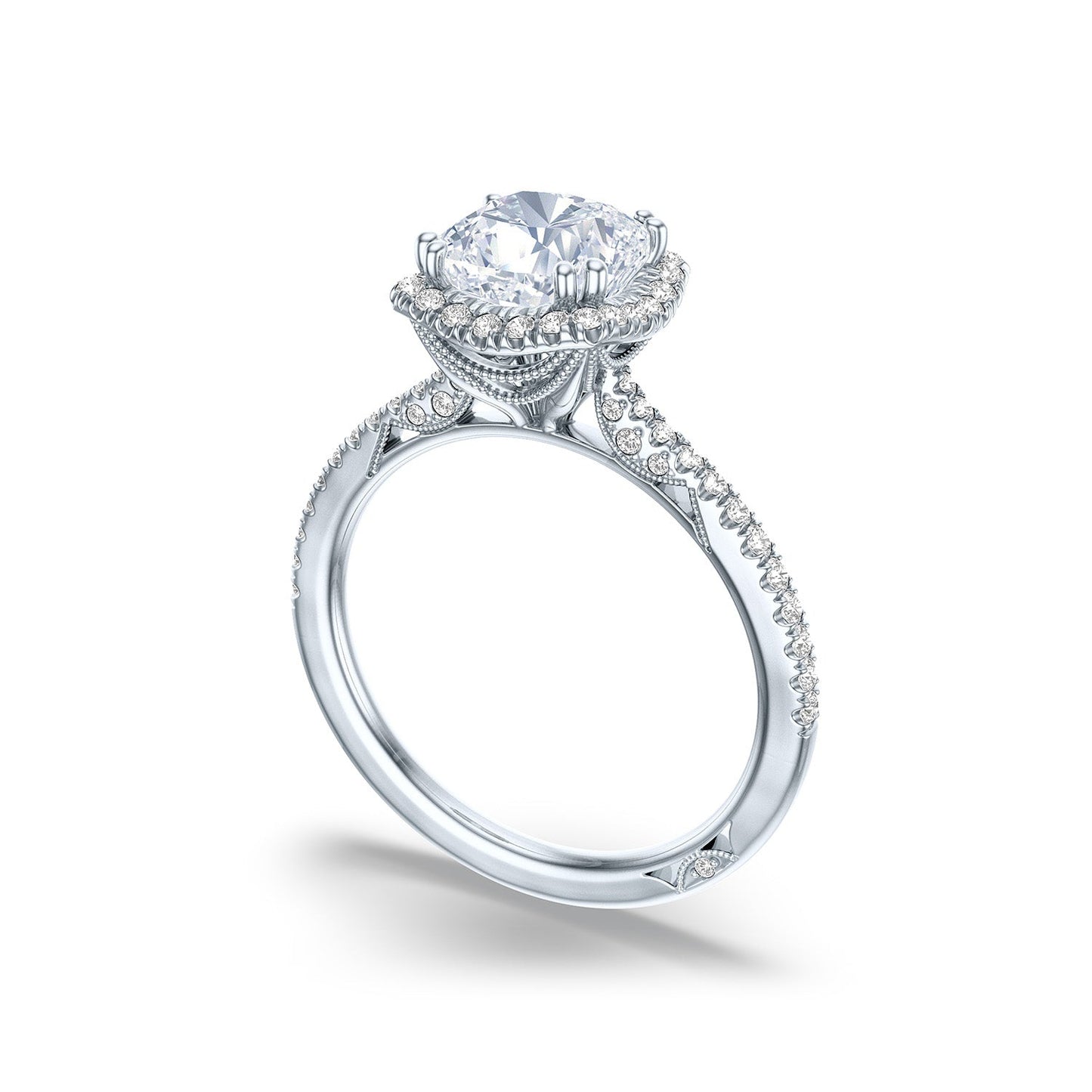 The Tacori Simply Tacori 18K Yellow Gold Cushion Semi Mount Engagement Ring showcases a breathtaking halo setting, where a striking diamond centerpiece is elegantly encircled by smaller diamonds. Featuring an intricately detailed band adorned with additional diamonds, this ring captures the timeless allure of classic engagement rings.