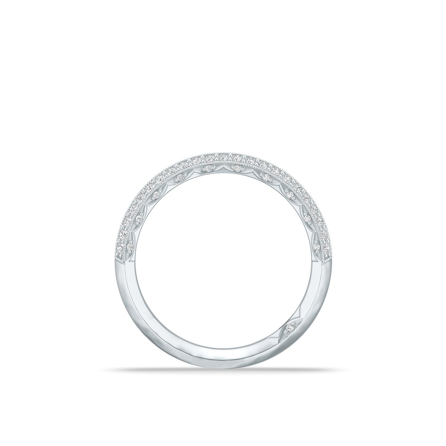 A Tacori Sculpted Crescent Knife Edge 18K White Gold Round Brilliant Diamond Anniversary Ring, displayed on a white background. The design is simple and elegant, reminiscent of diamond engagement rings, featuring a subtle textured pattern along the upper edge.