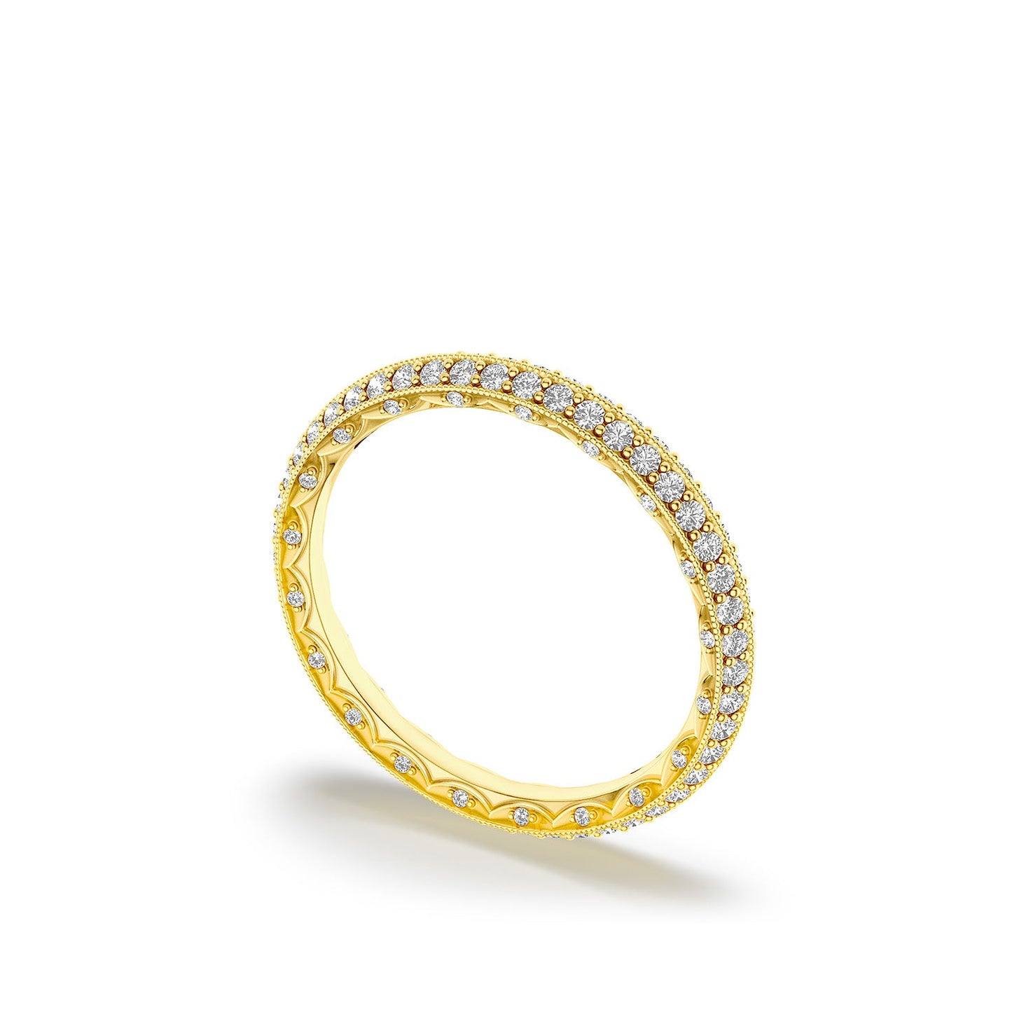 The Tacori Sculpted Crescent 18K Yellow Gold Round Brilliant Diamond Eternity Ring, encrusted with small diamonds forming a continuous sparkling circle, is displayed on a plain white background, slightly angled to highlight its intricate detailing and brilliant shine.