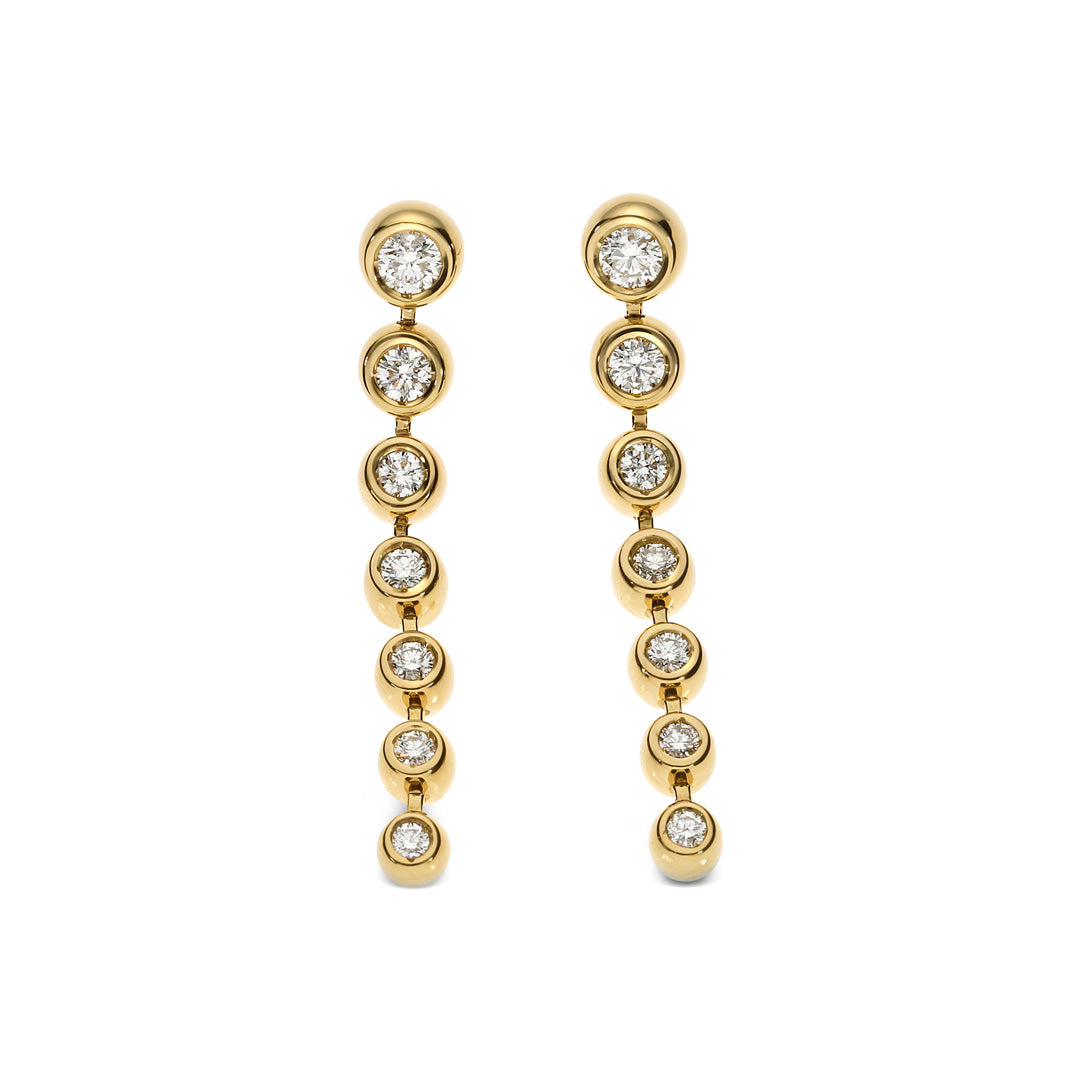 Part of the Leo Pizzo Bubble Collection, these 18K yellow gold diamond drop earrings feature a vertical row of bezel-set natural diamonds, arranged smallest to largest from top to bottom, creating an elegant and shimmering effect.