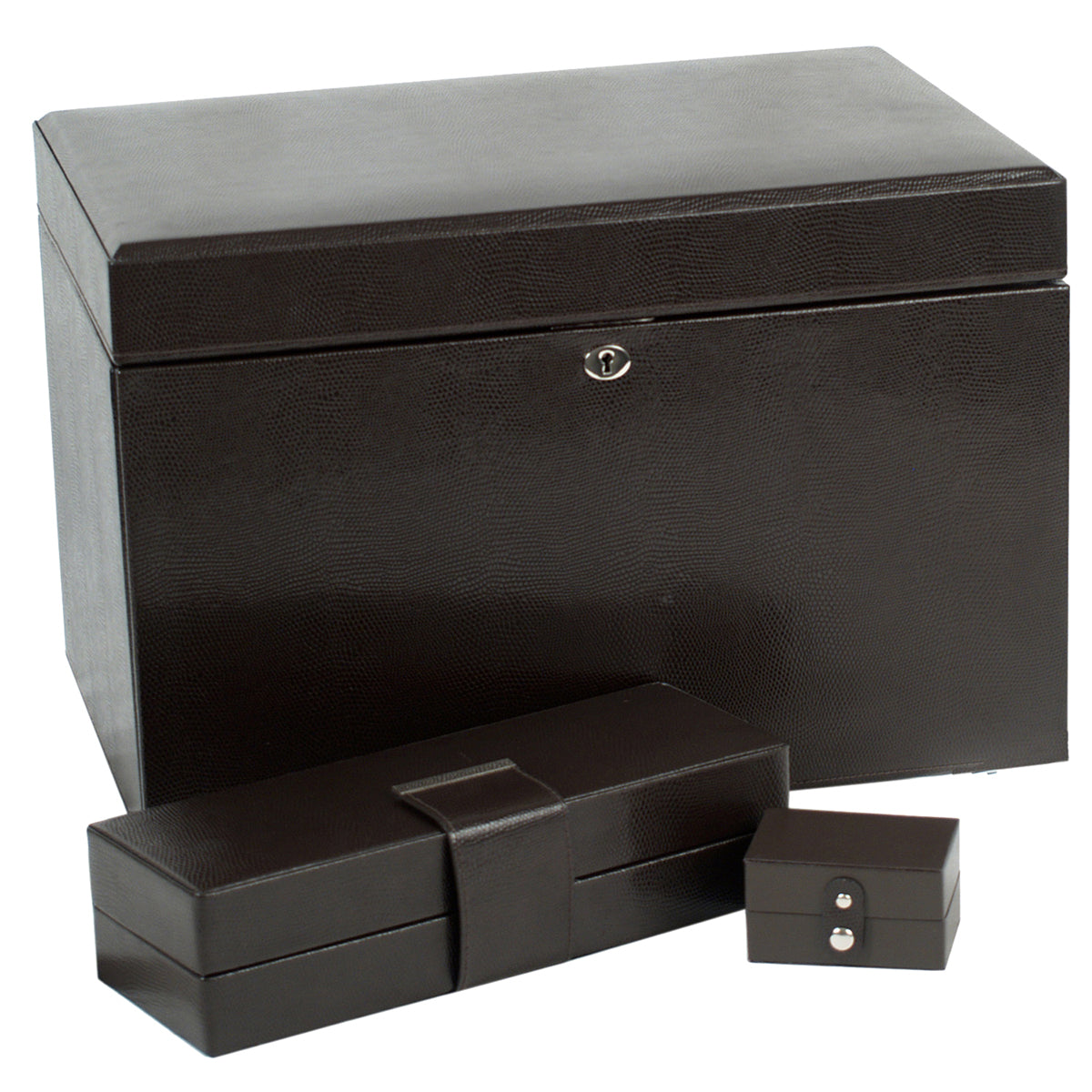 This elegant set, known as the WOLF 1834 London Large Jewellery Box, features three dark brown leather boxes in various sizes: a large chest, a medium rectangular box, and a small square jewellery box. Each piece is crafted from lizard embossed leather and equipped with clasps for secure closure. The LusterLoc technology ensures your treasures remain in pristine condition.