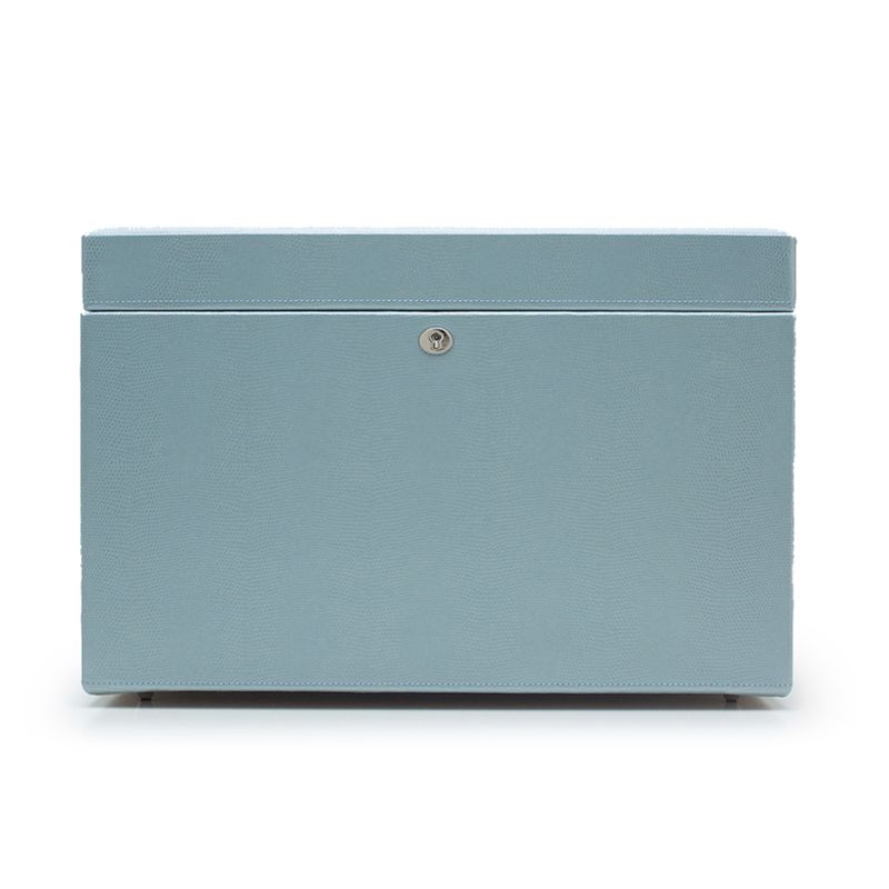 Discover the WOLF 1834 London Large Jewellery Box, a beautifully crafted light blue case with a square shape and a slightly raised top surface. Made from lizard embossed leather, it boasts a plain design with LusterLocâ„¢ technology and features a closed lid secured by a small central lock on the front.