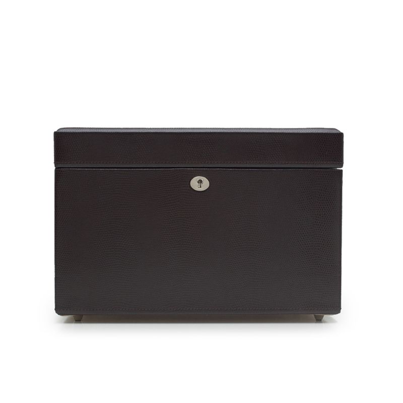 The WOLF 1834 London Medium Jewellery Box by WOLF is a black case with a textured lizard embossed leather surface and a sleek design, highlighted by a lockable clasp at the center. It features LusterLocâ„¢ technology and stands on small feet against a plain white background.