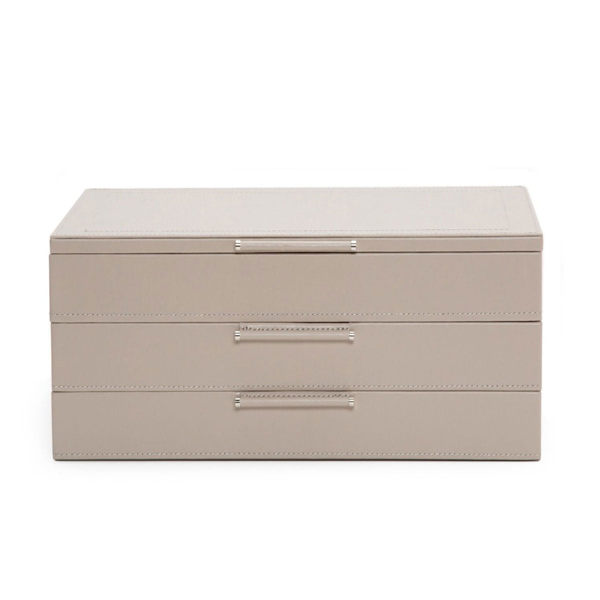 Introducing the WOLF 1834 Jewellery Box with Drawers, a rectangular, beige organizer crafted by WOLF from sustainable leather. It features three drawers adorned with sleek metal handles and LusterLoc anti-tarnish lining. This box offers a smooth texture and minimalist design, providing an elegant solution for jewelry storage.