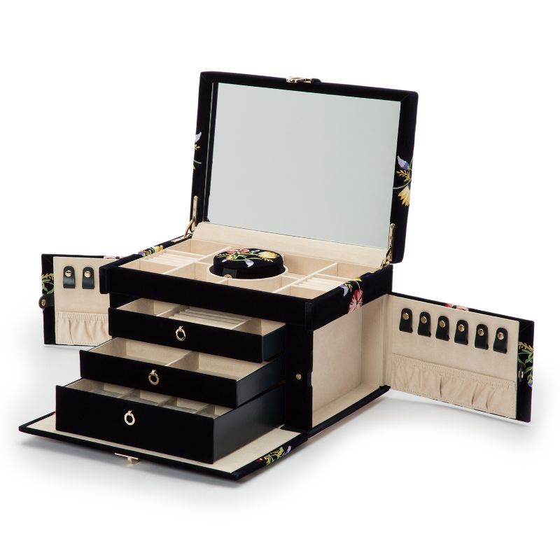 Discover the WOLF 1834 Zoe Large Jewellery Box, an elegant piece featuring a spacious interior with multiple compartments and drawers. Its sides extend to reveal convenient hooks for hanging items. The inside is lined with premium LusterLocâ„¢ fabric, while the mink velvet exterior is adorned with a sophisticated black floral design, providing luxurious storage for your jewelry collection.
