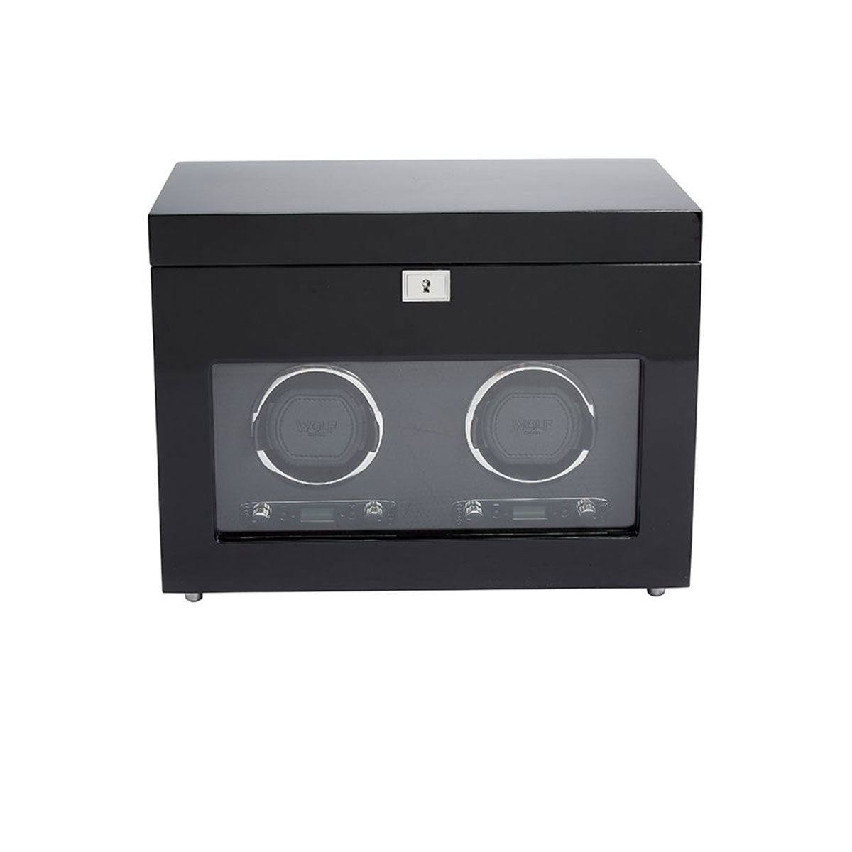 The WOLF 1834 Savoy Double Watch Winder with Storage, by the brand WOLF, showcases a black finish with a transparent front that can hold two watches. It features a sleek, modern design complemented by gold-finished hardware and includes a lock on top for added security.