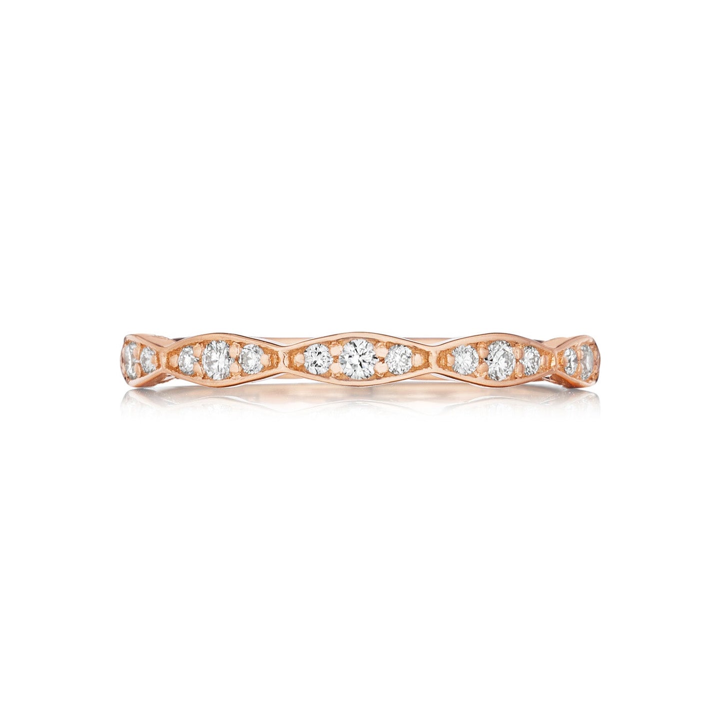 This Tacori Sculpted Crescent Marquise Design 18K Rose Gold Round Brilliant Diamond Eternity Ring exemplifies the elegance of diamond engagement rings. Its sleek design features a row of small, sparkling diamonds set in marquise shapes, creating a sculpted crescent motif that adorns the band evenly.