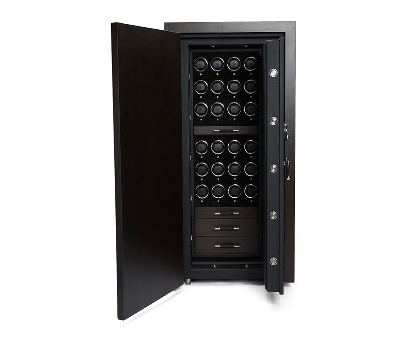 The WOLF 1834 Churchill 24 Piece Winder Safe, from the renowned brand WOLF, features a luxurious design with an open door that reveals rows of watch winders. Mahogany wood drawers are elegantly placed at the bottom, and its vault door is equipped with multiple locking mechanisms for ultimate security and sophistication.