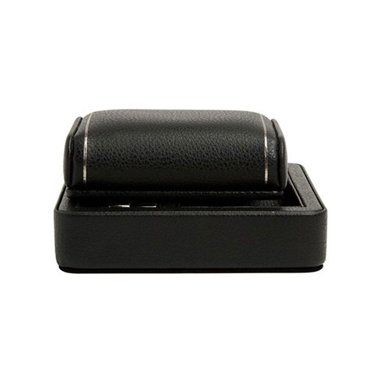 The WOLF 1834 British Racing Single Travel Watch Stand, crafted by WOLF, is a black, textured vegan leather watch stand with a sleek rectangular base and rounded top, designed to securely hold and rotate a wristwatch.