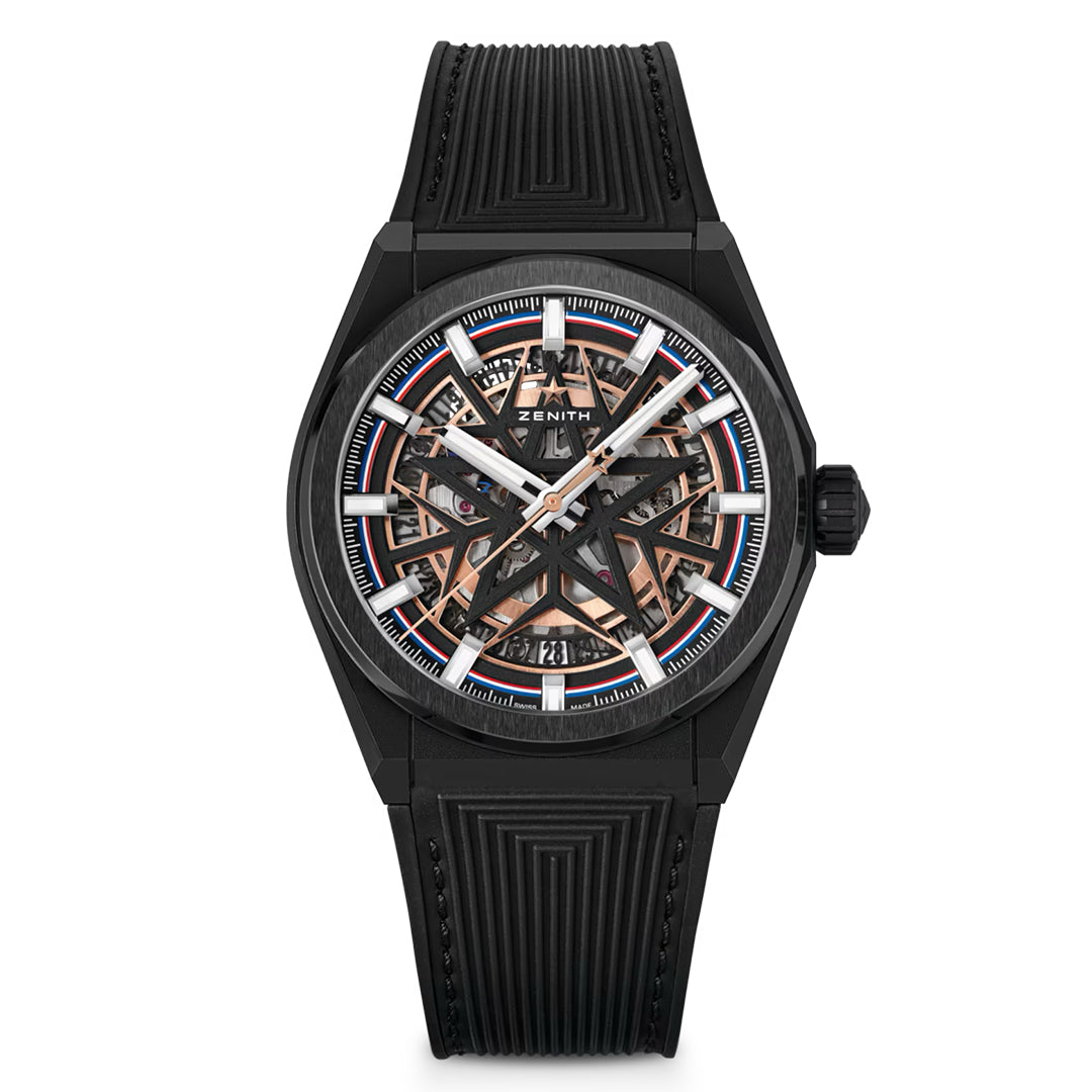 The ZENITH Defy Classic Elite 670 SK 41mm Watch is a black ceramic watch with a skeleton dial revealing intricate mechanics. It features rose gold and silver accents, white hour markers and hands, a textured black strap, and the "Zenith" logo on the face. Part of the DEFY Classic Fusalp collection.