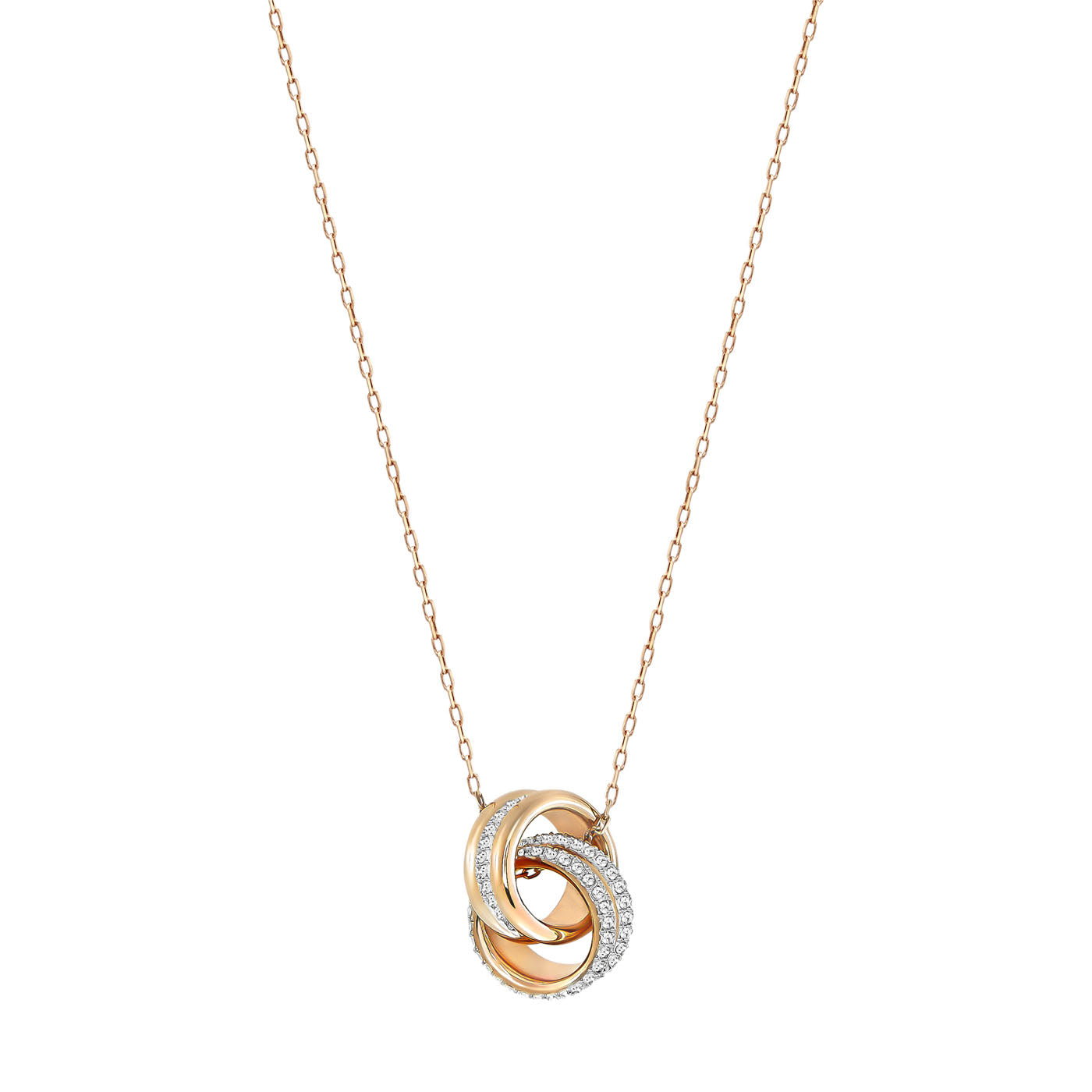 The Swarovski Rose Gold Further Necklace Pendant by Swarovski features a delicate gold chain with a pendant of interlocking rings. One ring is crafted in gold, another in silver, while the third sparkles with crystal pavé stones. Subtle rose gold plating enhances its elegant design, adding sophistication and charm.