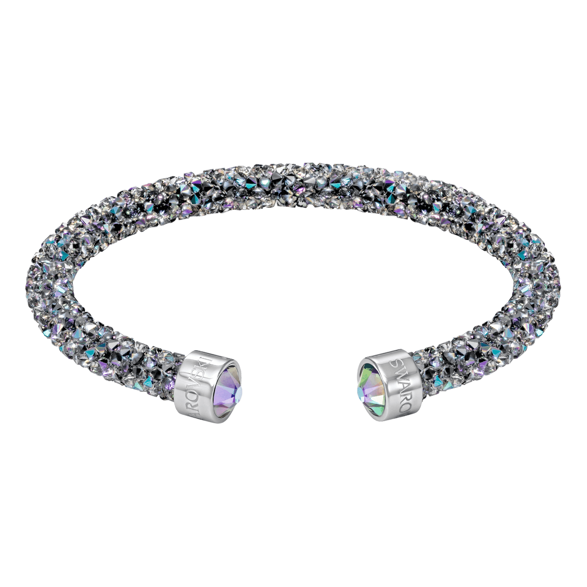 The Swarovski Crystal Dust Cuff Cry PSH/STS by Swarovski dazzles with iridescent crystal accents in mesmerizing shades of blue, purple, and silver, set against a white backdrop. This elegant piece features metallic end caps engraved with lettering and is available at Raffi Jewellers—a standout from the Swarovski Canada collection.