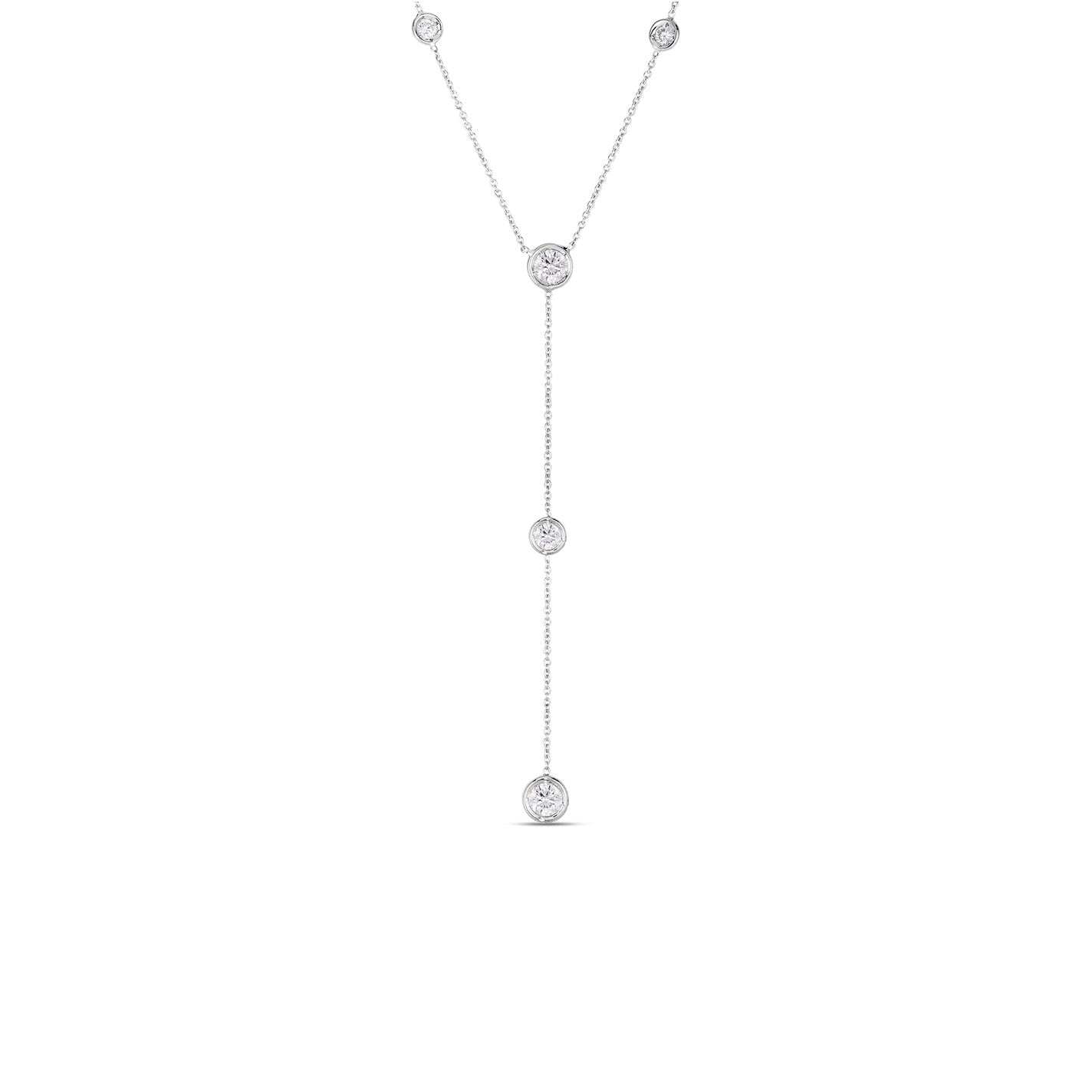 The Roberto Coin Diamonds By The Inch 18K White Gold Five Station Y Necklace showcases a delicate yet minimalist design with five diamond stations evenly placed along the chain. This elegant piece, set against a plain white background, is ideal for both formal and casual wear.