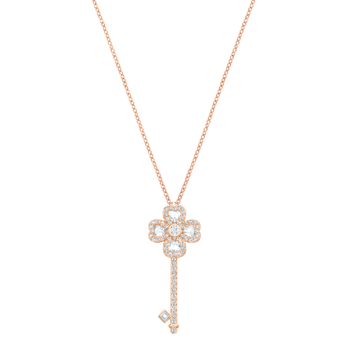 The Swarovski Deary Key Small Necklace R features a rose gold chain and a key-shaped pendant embellished with sparkling diamonds and an intricate floral design at the top. This elegant piece from Swarovski, available at Raffi Jewellers and Swarovski Canada, adds a touch of timeless sophistication to any jewelry collection.