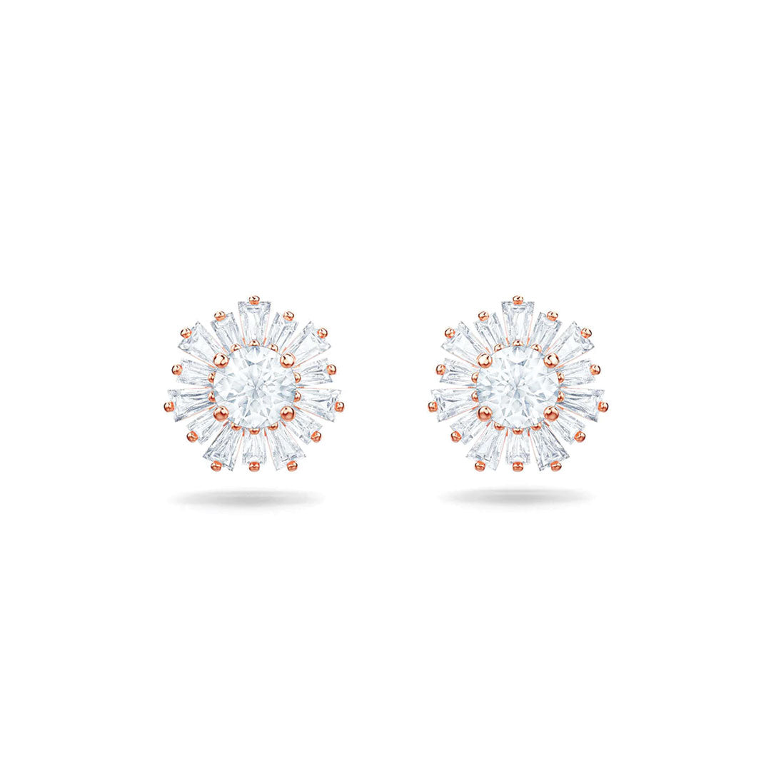 The Swarovski Attract Mix Cut Stud Earrings radiate timeless elegance with their sophisticated design. Each silver-toned piece features a central circular gem surrounded by dazzling baguette-cut stones, making them the perfect Mother's Day gift for those who appreciate sparkling sophistication.