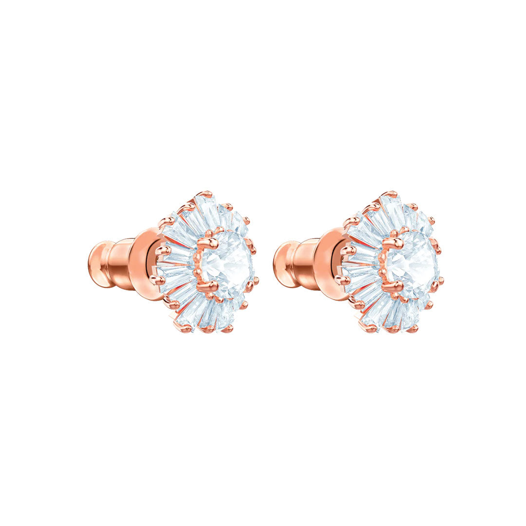 The Swarovski Attract Mix Cut Stud Earrings exude timeless elegance with their rose gold design, featuring a central round diamond encircled by a fan-like array of baguette diamonds. They make an exquisite choice for a Mother's Day gift.