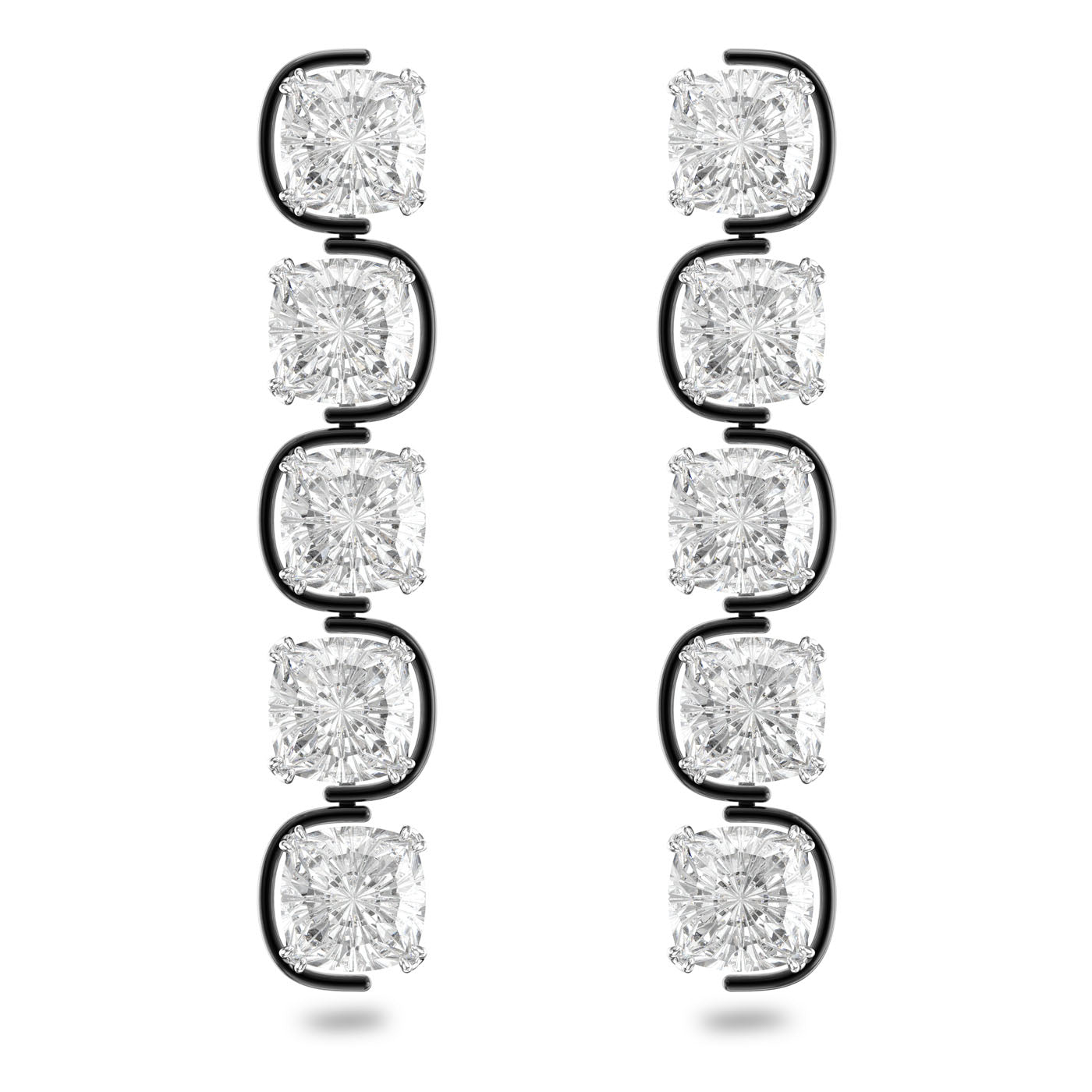 A pair of Swarovski Harmonia Cushion Cut Floating Crystals Drop Earrings, designed by Giovanna Engelbert, showcases five square-cut crystals vertically arranged in a black metal setting. The rhodium-plated earrings feature bright stones that are slightly separated and elegantly displayed against a white background.