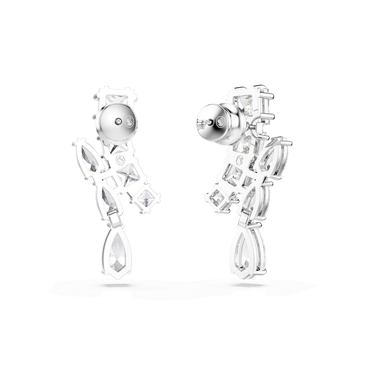 A pair of Swarovski Matrix drop earrings, featuring mixed-cut clear gemstones arranged in an artistic dangling pattern and set in rhodium-plated silver-tone metal, displayed against a white background.
