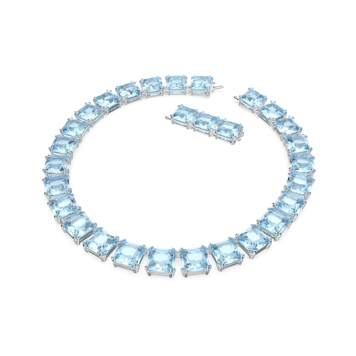 Explore the opulent Swarovski collection featuring the Cushion Cut Crystal Harmonia Choker, designed with rhodium plating. This stunning piece highlights square-cut light blue crystals set in a metallic frame, artfully displayed in a circular arrangement against a white background.