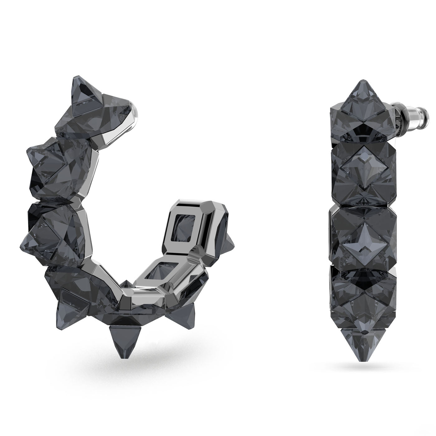 A pair of Swarovski Pyramid Cut Crystal Ortyx Hoop Earrings, featuring dark, intricately designed half-hoops with multiple geometric facets. Displayed against a white background, one earring is in a side view that highlights its open hoop shape, while the other is shown from the front with a pointed end—a true geometric statement.