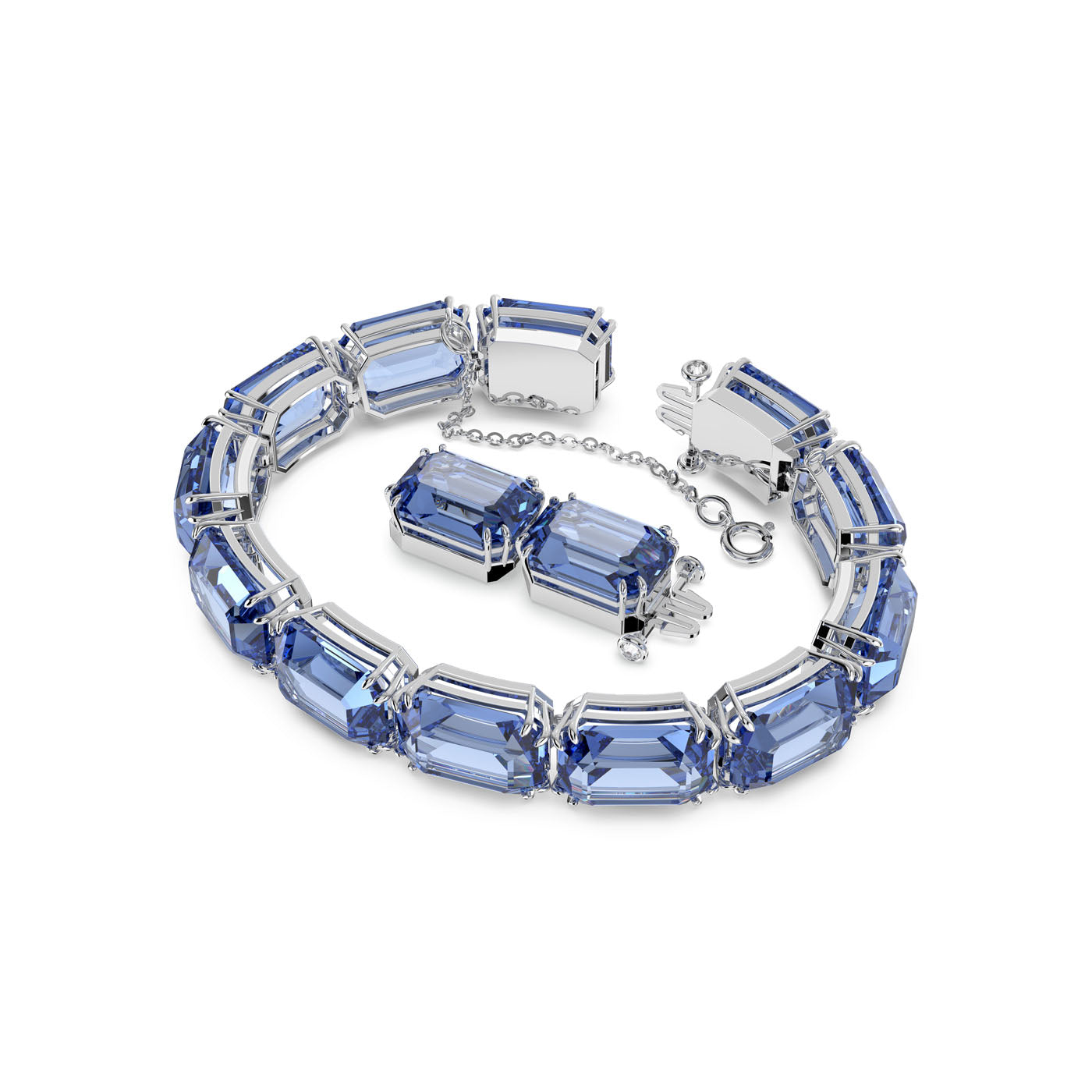This exquisite bracelet and necklace set, hailing from Swarovski's Millenia collection, showcases large, rectangular blue gemstones. The stunning octagon-cut crystals are meticulously arranged in a repeating pattern with chain links and a secure clasp, all beautifully presented against a simple white background.