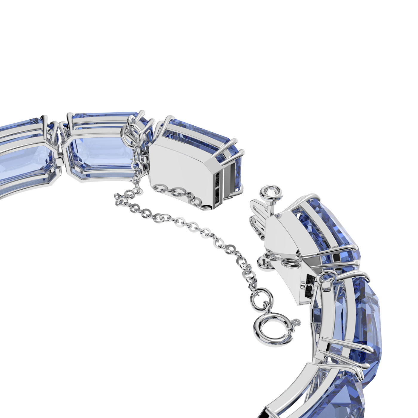 A close-up of the Swarovski Blue Octagon Cut Crystal Millenia Bracelet showcases its large rectangular blue gemstones. This elegant piece from Swarovski's Millenia collection features a delicate chain and a round clasp, enhancing its sophisticated design.