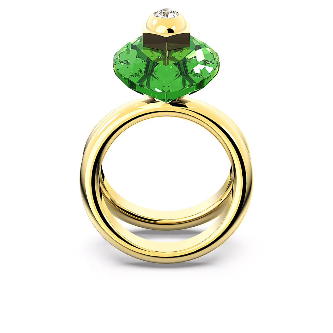 The exquisite Swarovski Numina Ring showcases a stunning gold cocktail design featuring a large green crystal and a small diamond, beautifully set against a plain white background—an iconic piece that embodies Swarovski's unique style reminiscent of Giovanna Engelbert.
