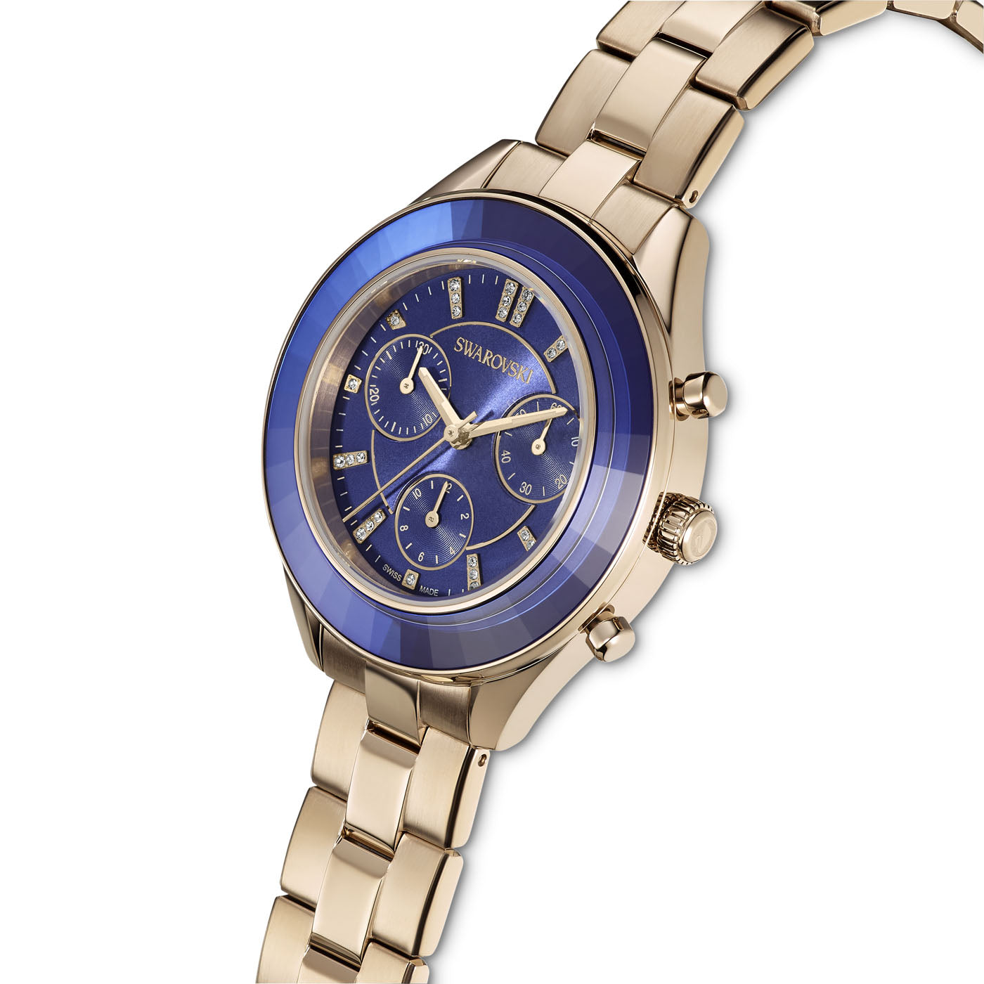 The Swarovski Stainless Steel Champagne-Gold Tone Octea Lux Sport Bracelet is a Swiss Made timepiece with a sapphire-blue dial and multiple subdials, adorned with crystal accents, elegantly displayed on its matching gold bracelet.