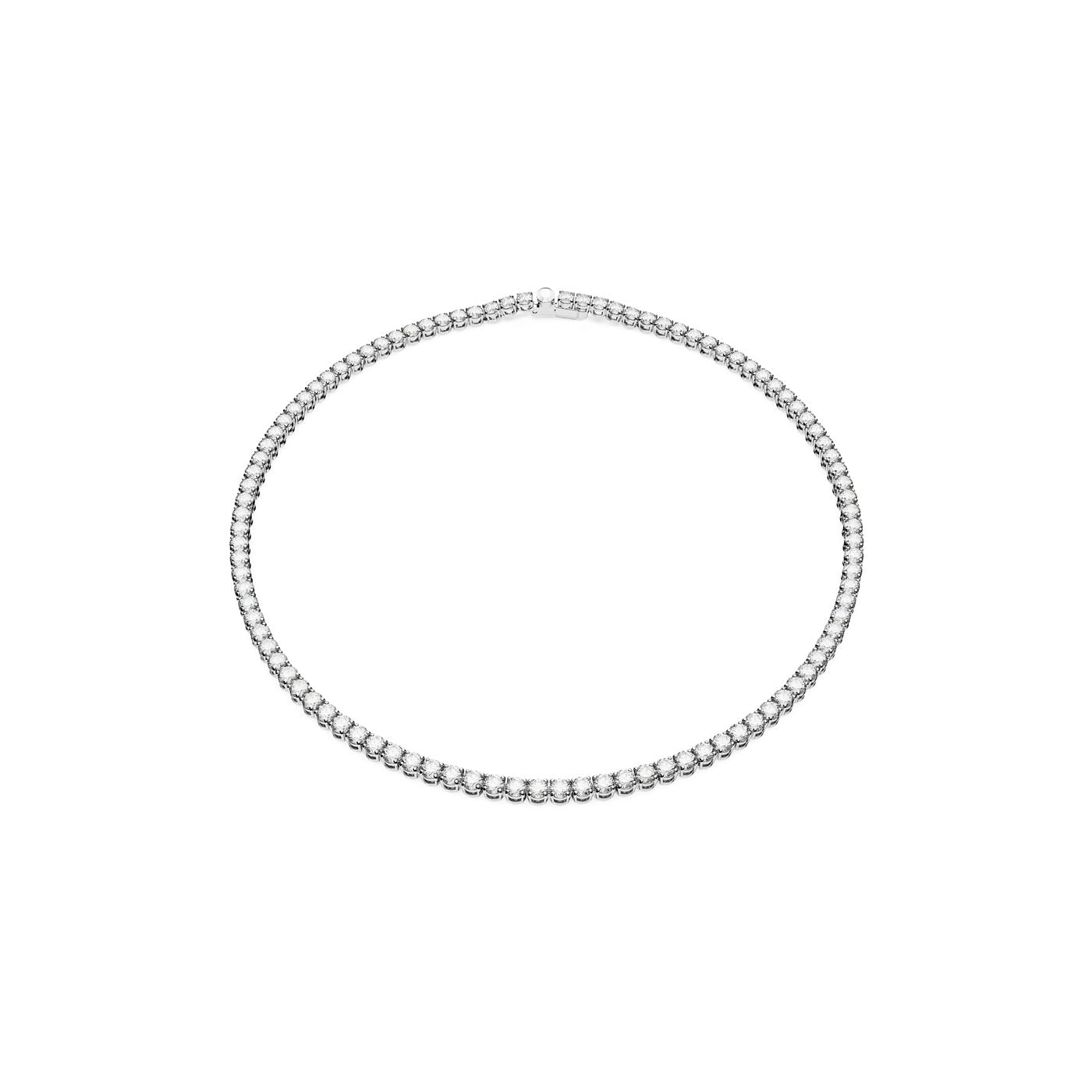 Introducing the Swarovski Round Cut Crystal Matrix Tennis Necklace, a delicate silver piece featuring a rhodium-plated design with shimmering clear stones arranged in a continuous line, beautifully showcased on a white background.