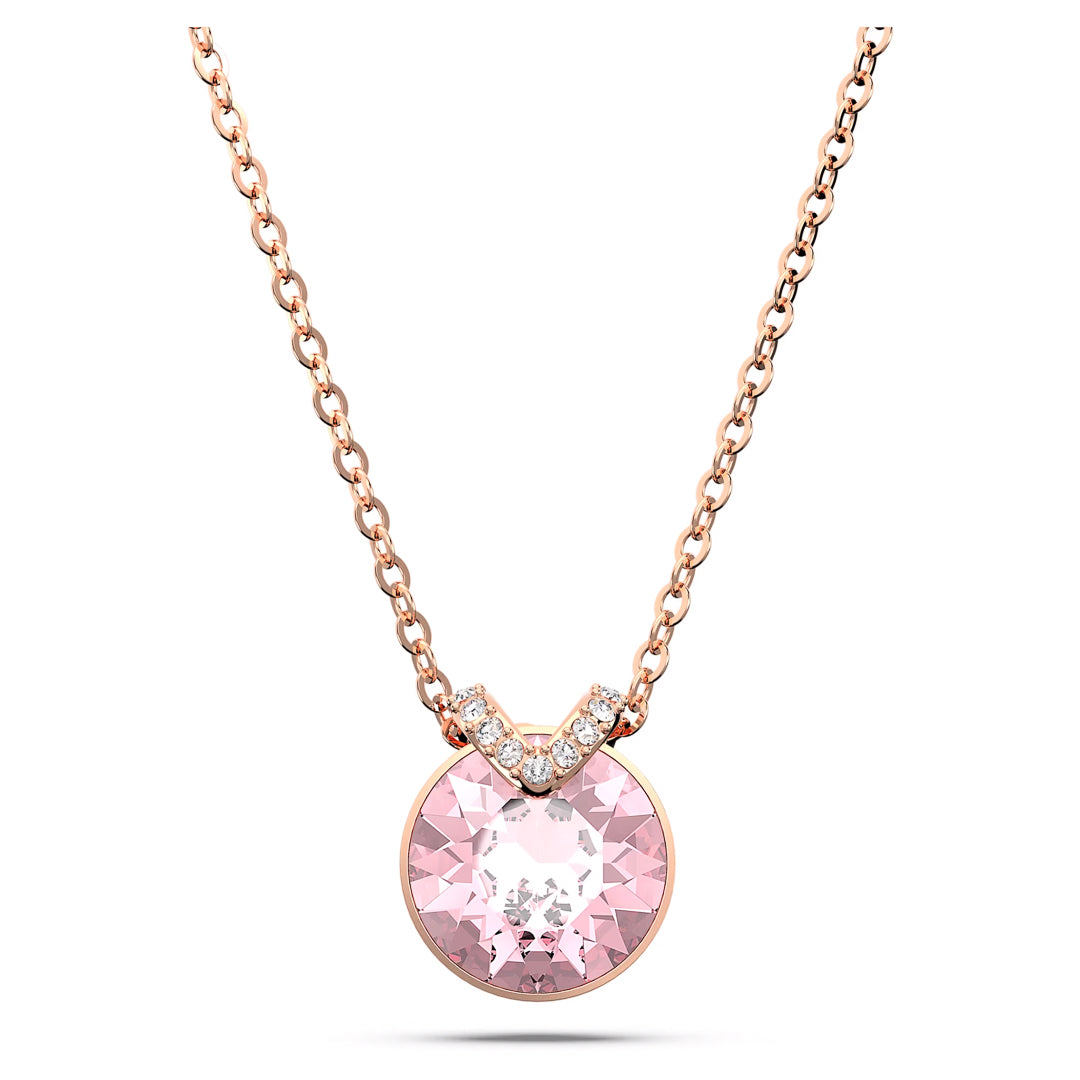 Introducing the Swarovski Bella V Necklace Pendant by Swarovski, a romantic piece featuring a rose gold-tone plating and a pink center stone pendant. This stunning gemstone is accented with small clear crystals forming an elegant V shape above it, delicately suspended from a fine chain.