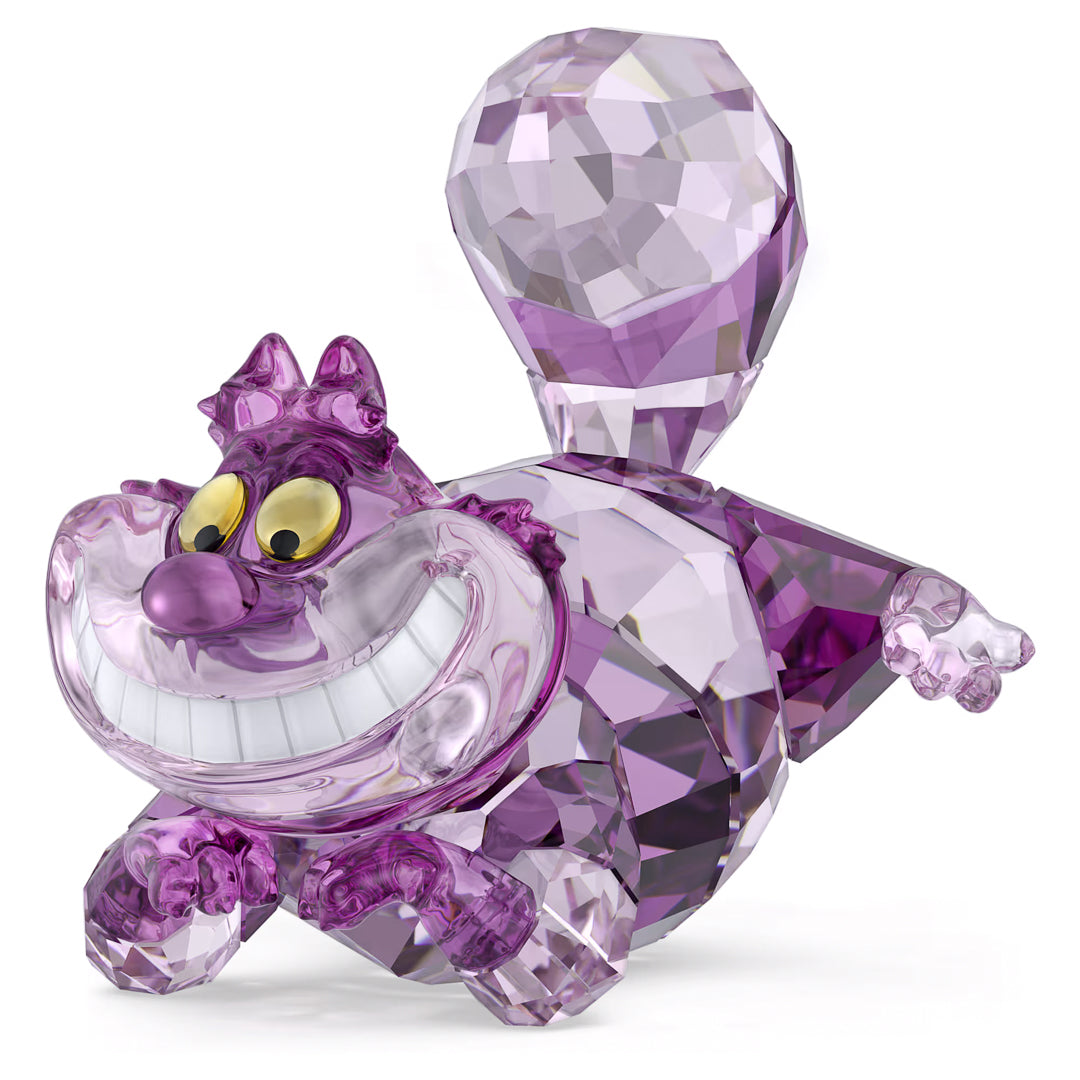 The Swarovski Alice in Wonderland Cheshire Cat Home Décor piece, created by Swarovski, is a crystal figurine that mirrors the enchanting Cheshire Cat with its iconic wide grin. This sculpture is mainly purple and features striking yellow eyes and a prominent striped tail, perfectly embodying the playful and mischievous charm from Alice in Wonderland.