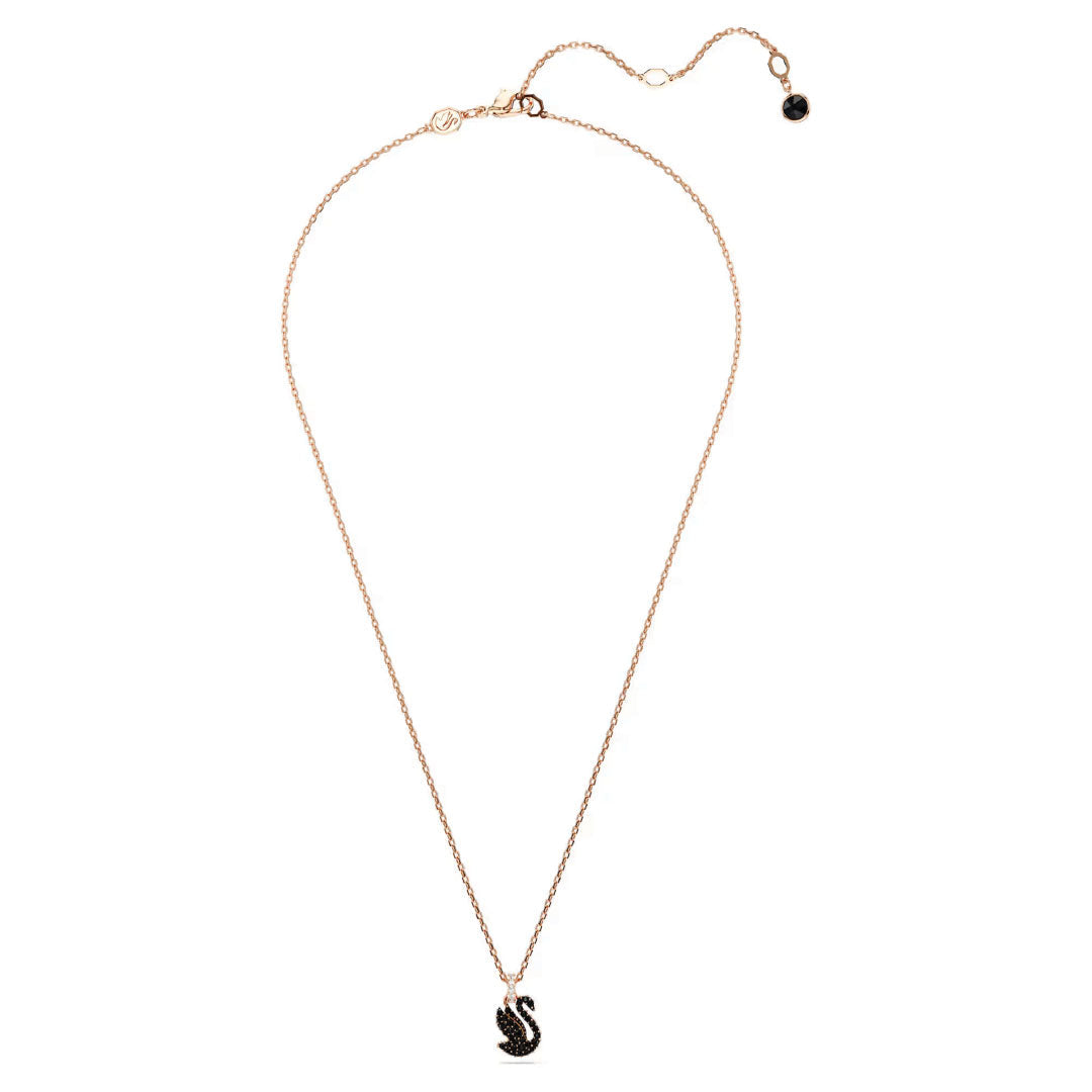 Introducing the Swarovski Swan Necklace Pendant by Swarovski, crafted in a delicate rose gold-tone and accentuated with a swan design adorned with jet black crystals. The necklace features an adjustable clasp, enhanced by a small black bead at the end.