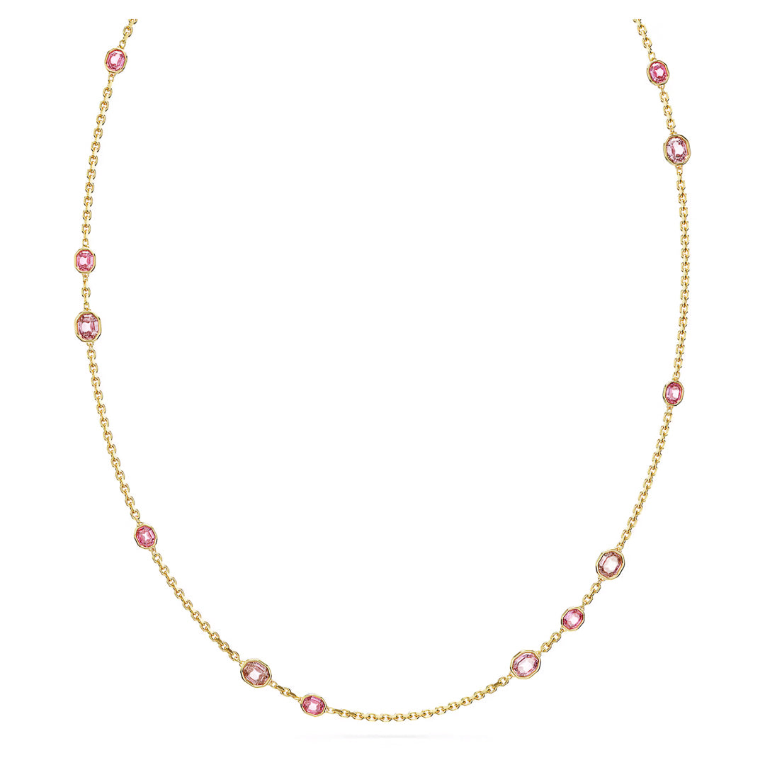 The Swarovski Imber Strandage Necklace is a delicate gold piece showcasing evenly spaced pink gemstones in circular settings, enhanced with radiant octagon-cut crystals. Its simple and elegant chain perfectly accentuates the vibrant colors of the stones, epitomizing Swarovski's renowned craftsmanship.