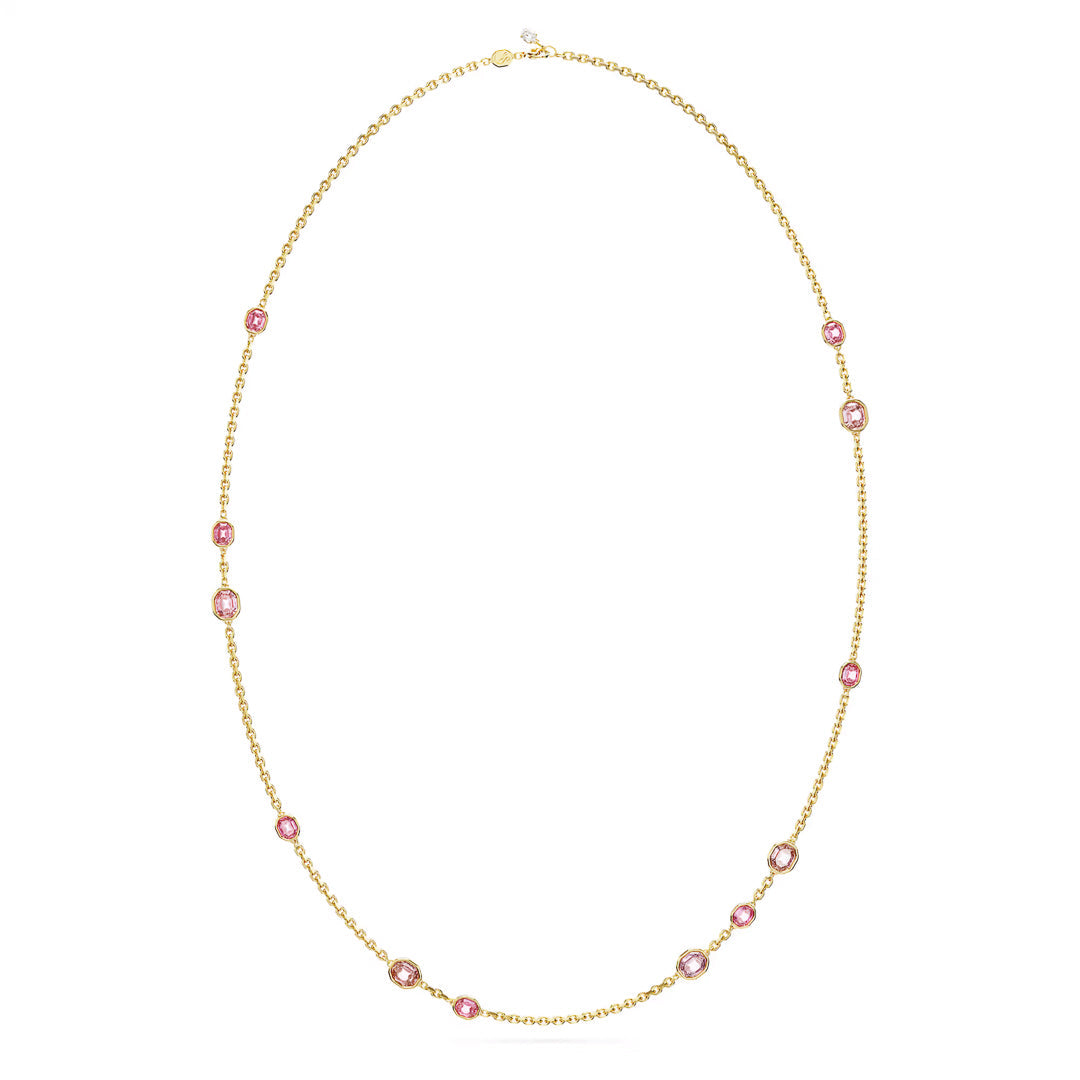 The Swarovski Imber Strandage Necklace is a delicate piece featuring evenly spaced pink Swarovski Zirconia set in circular gold settings. The chain's fine, elegant design beautifully highlights the vibrant stones.