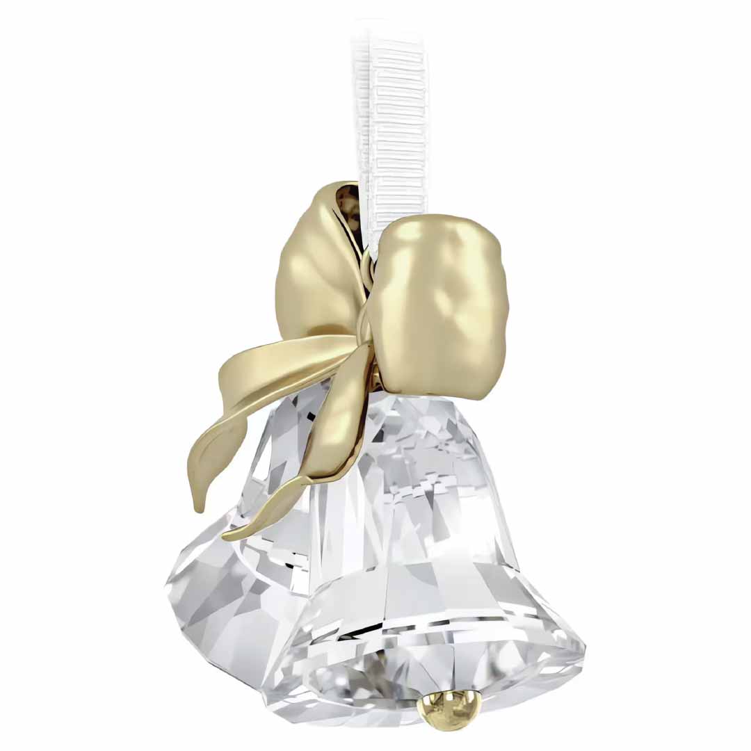 The Swarovski Holiday Magic Bells Ornament Home Décor, crafted by Swarovski, features interconnected crystallized bells with a champagne gold-tone metal bow on top. It includes a white ribbon loop for hanging, and the clear, faceted bells beautifully catch the light to create a sparkling effect.