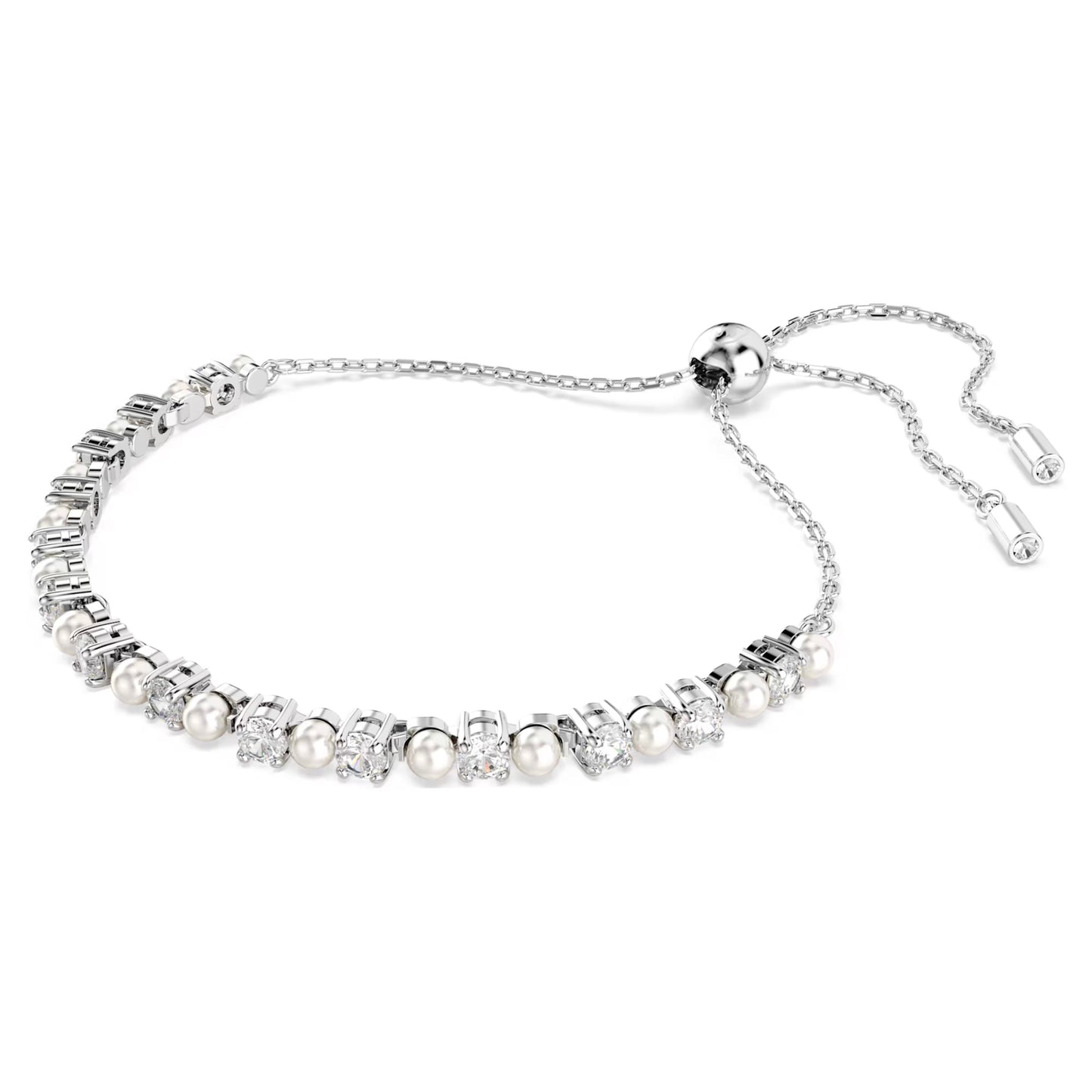 The Swarovski Matrix Bracelet is a silver piece that showcases a stunning combination of Swarovski Crystal Pearls and gemstones. It features a slider clasp for adjustable sizing and is elegantly designed with alternating pearl and gemstone elements set against a polished silver base, making it timeless.