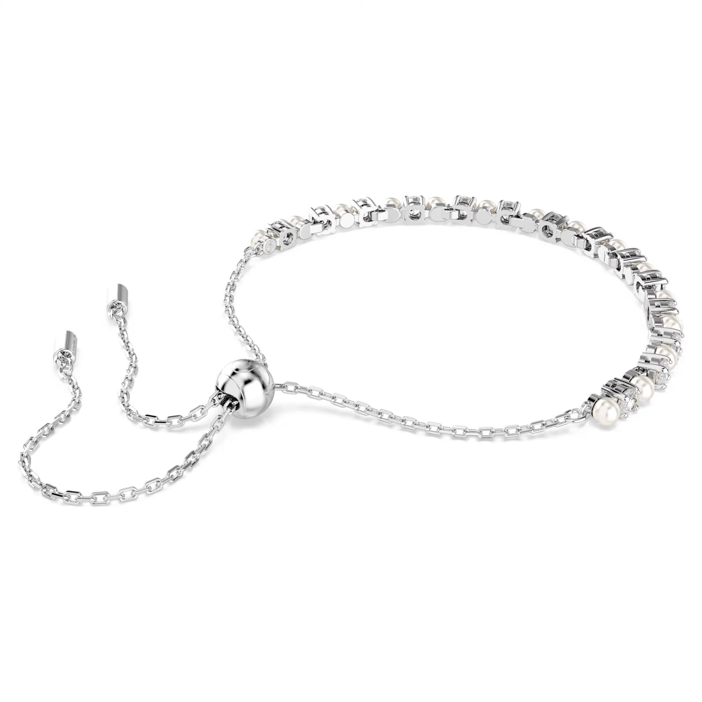 The Swarovski Matrix Bracelet features a sophisticated silver design, complete with an adjustable chain and slider clasp. It showcases rectangular and round clear stones, beautifully accented by a Swarovski Crystal Pearl on one side, all set against a pristine white background.