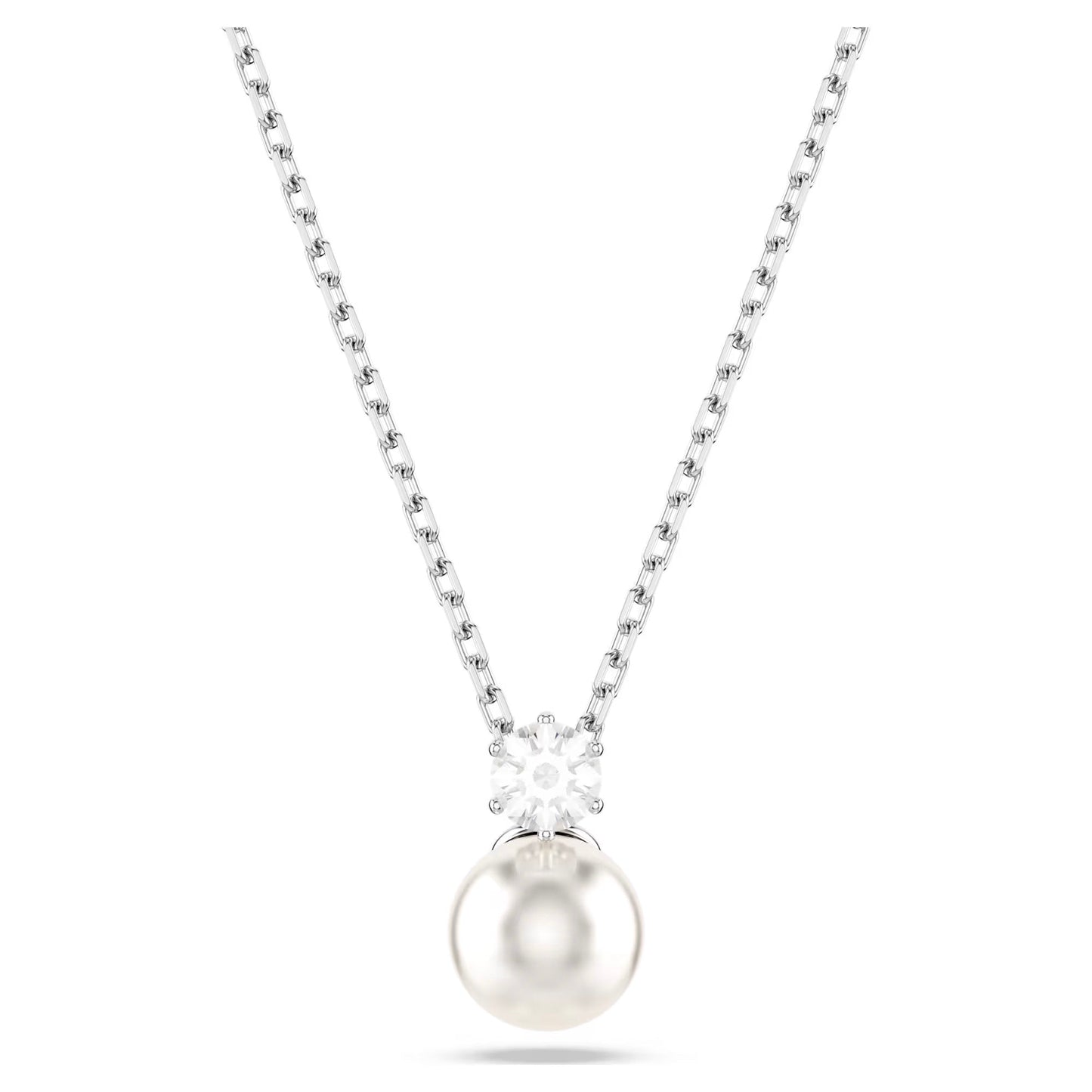 The Swarovski Matrix Necklace Pendant by Swarovski showcases a refined silver chain adorned with a prominent Swarovski Crystal Pearl pendant. Atop the pearl sits a petite round Swarovski Zirconia gemstone, infusing the piece with elegance and brilliance.