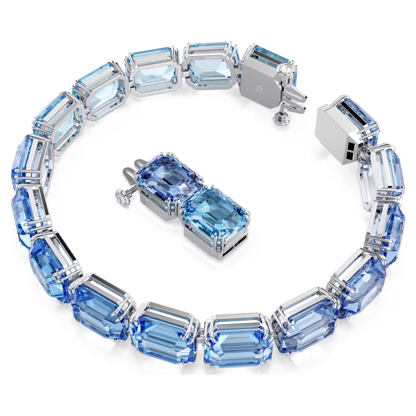 Introducing the Swarovski Millenia Tennis Bracelet: This exquisite piece showcases large, rectangular blue gemstones intricately set within silver links and arranged in a stunning circular design. The bracelet features a partially open clasp for added security, while the high-shine Swarovski ReCreated™ crystals enhance its luminous allure.