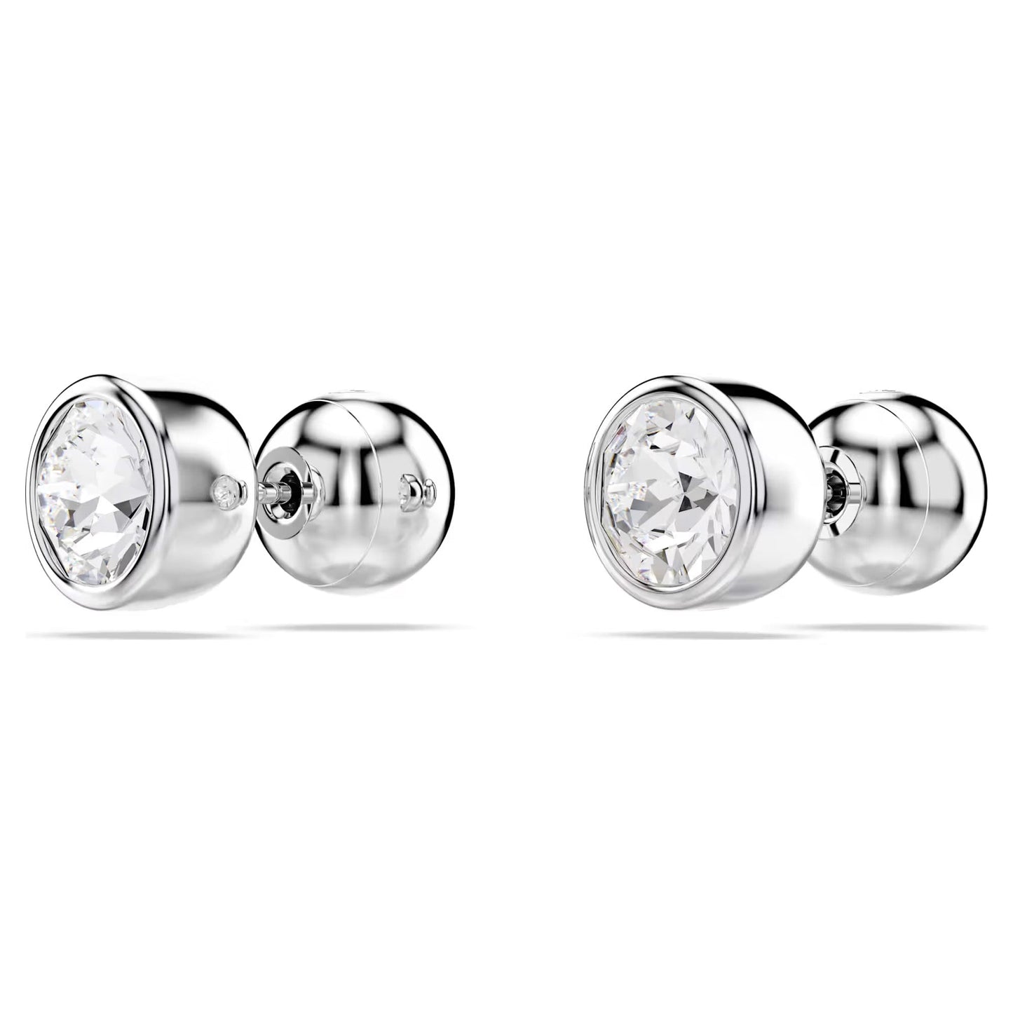 The Swarovski Imber Stud Earrings, crafted by Swarovski, are rhodium-plated with each earring showcasing a clear round crystal set in a sleek metal casing, beautifully displayed against a white background.