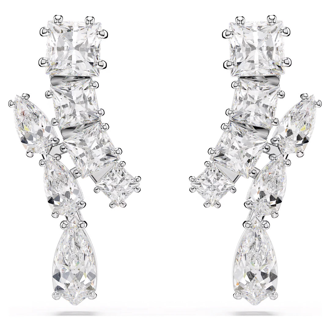 Introducing the Swarovski Matrix Drop Earrings by Swarovski: an elegant and luxurious accessory showcasing a cascade of sparkling square, rectangular, and teardrop-shaped Swarovski Zirconia set in rhodium-plated silver.