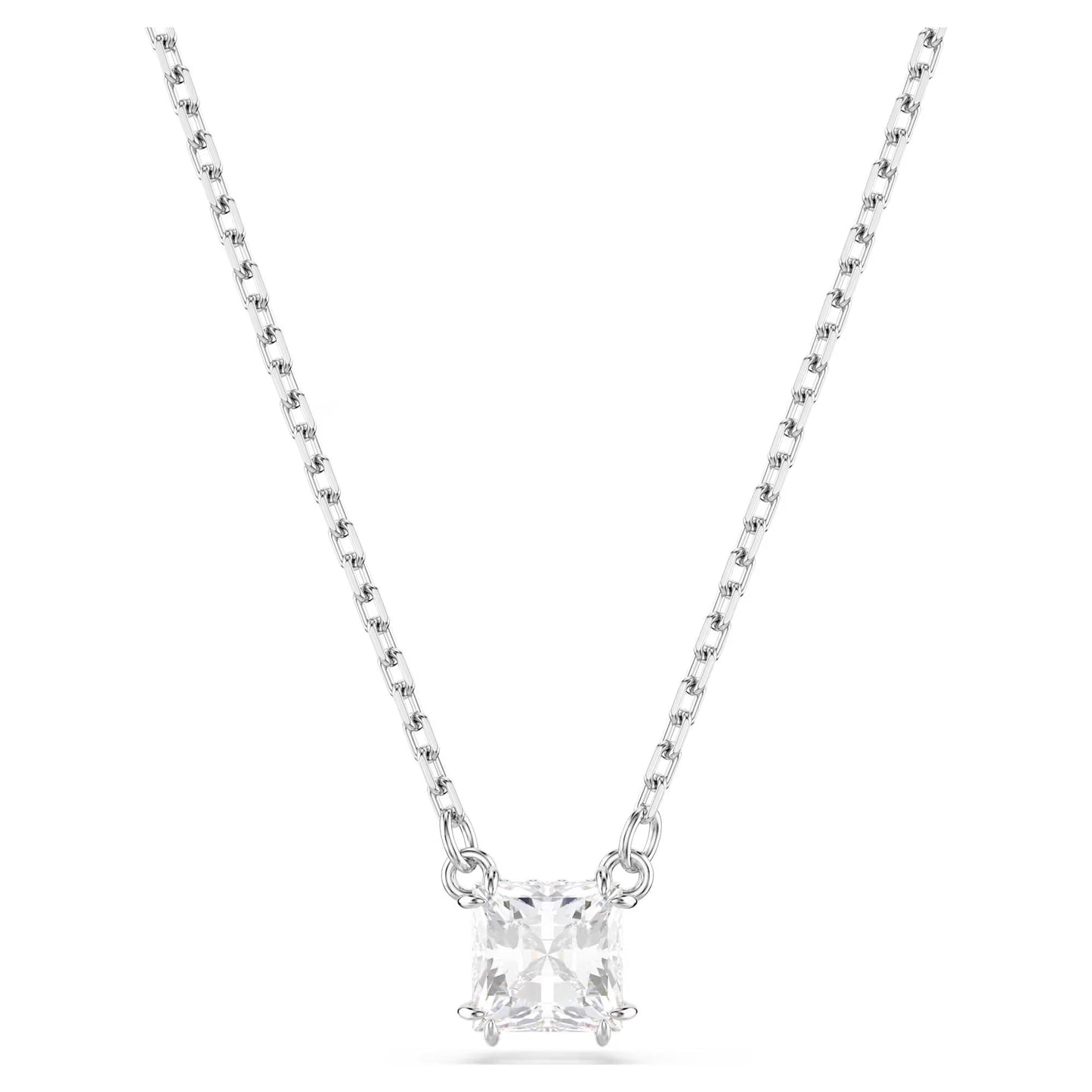 The Swarovski Stilla Attract Square Cut Necklace Pendant by Swarovski showcases a delicate rhodium-plated chain that elegantly forms a V-shape, perfectly highlighting the centerpiece: a square-cut Swarovski Zirconia gemstone held in place by a four-prong setting.
