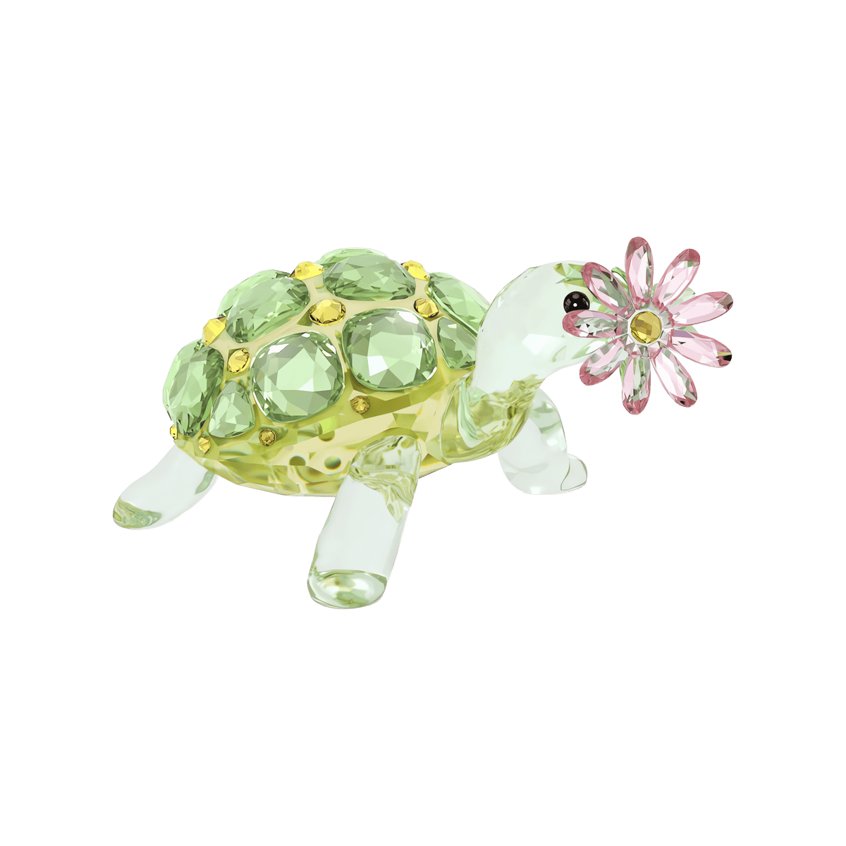 The Swarovski Idyllia Tortoise and Daisy by Swarovski is a decorative glass figurine depicting a mother tortoise with green gem-like spots on its shell and delicately holding a pink crystal daisy in its mouth, beautifully set against a white background.