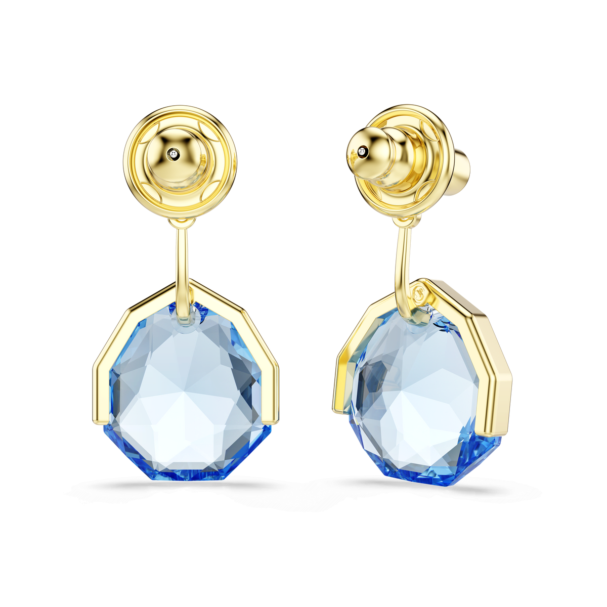 Swarovski Gema earring jackets, featuring dangling octagonal blue crystals set within a geometric 18K gold finish frame, are displayed on a plain white background. These elegant Swarovski earrings showcase faceted accents that catch the light beautifully, offering a timeless and sophisticated look.