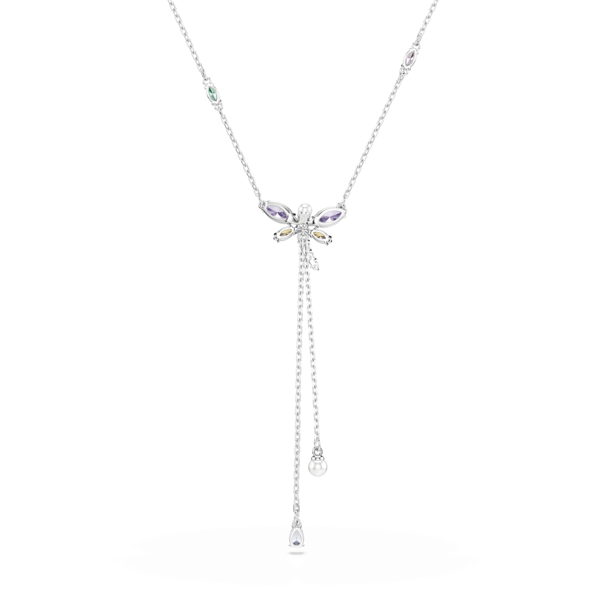 Swarovski Ariana Grande x Swarovski Y necklace, a rhodium-plated piece featuring a dragonfly-shaped pendant adorned with multicolored mixed-cut Swarovski Zirconia gemstones and two dangling chains finished with sparkling gem-accented drops. Additional Swarovski Zirconia accents are spaced along the length of the chain.